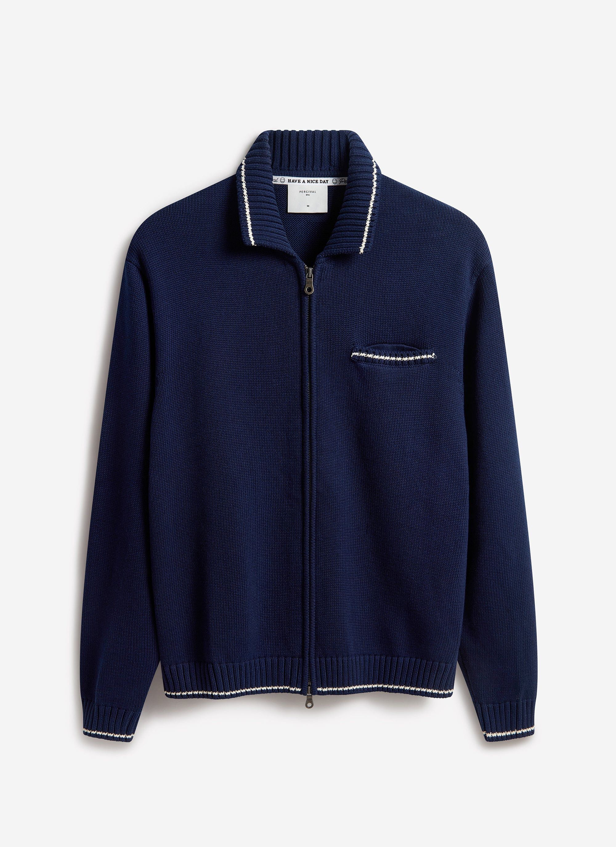 The Percival Gardner Dense Knitted Zip Cardigan in navy cotton, laid flat to showcase its contrast stitch detailing.