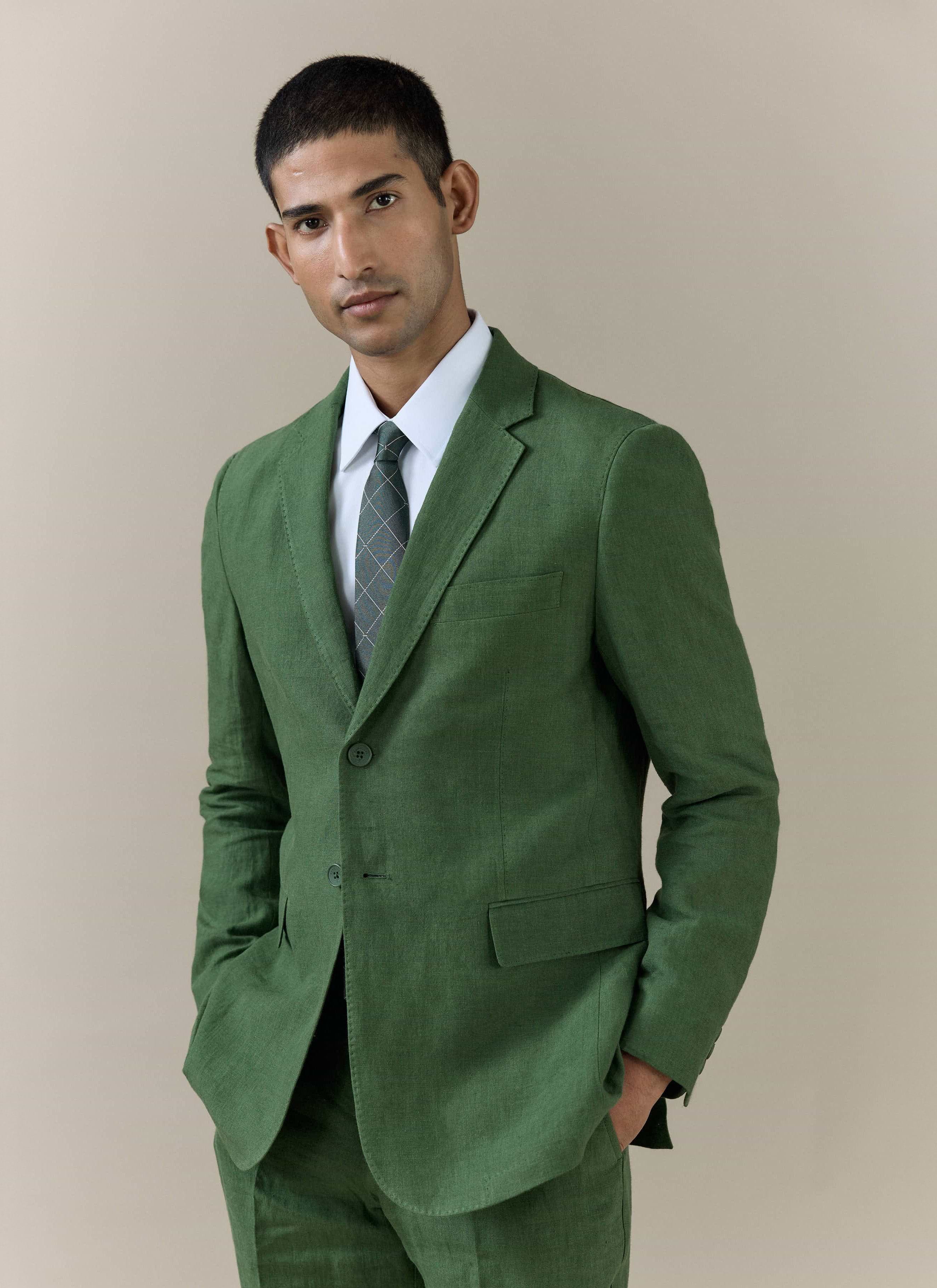 Forest green Slim Fit Classic Blazer in linen by Percival, shown on a model with a white shirt and patterned tie.