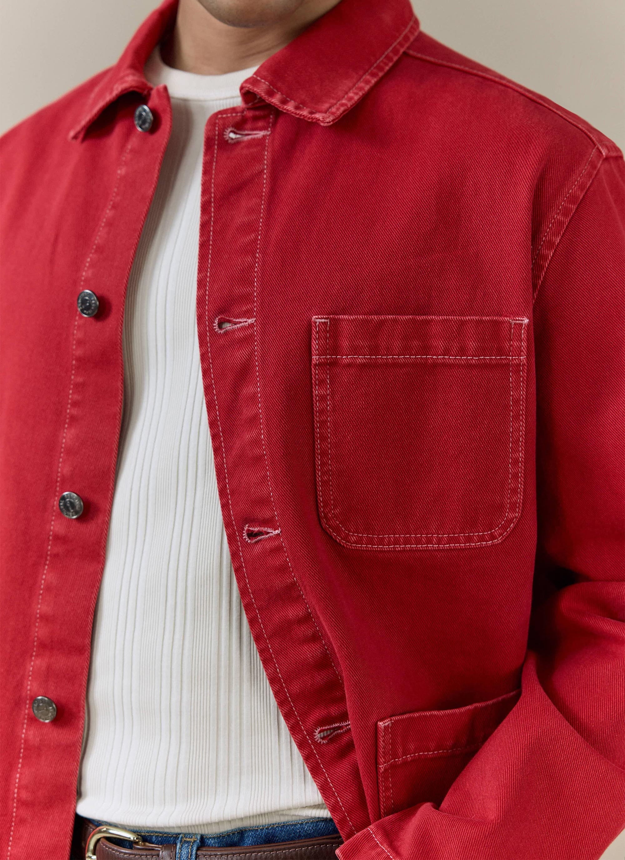 Close-up of the red cotton canvas Oliver Chore Jacket from Percival, showing the vintage wash finish and chest pocket.
