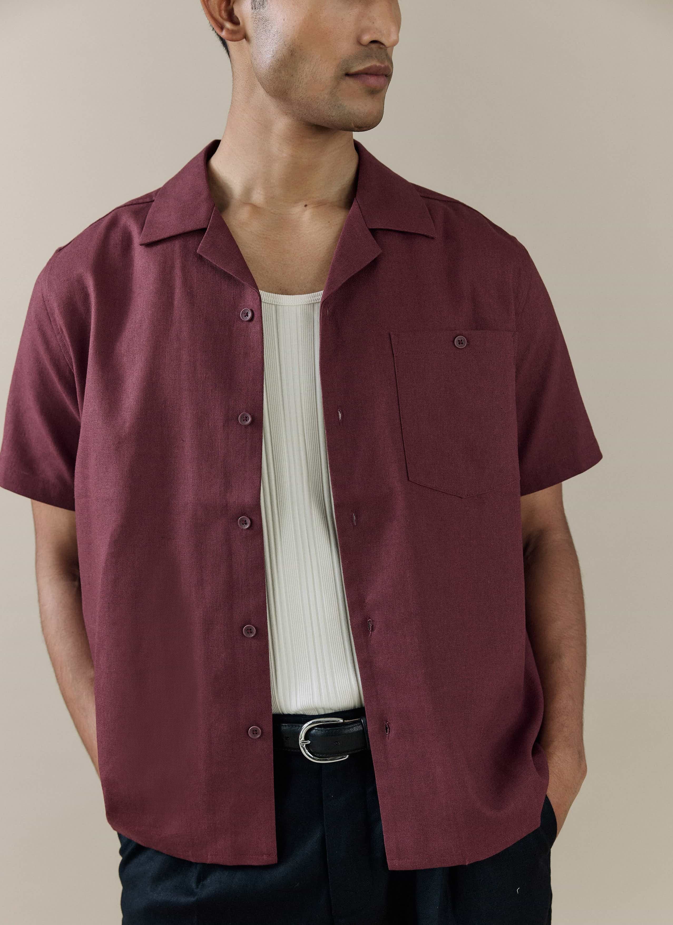 Percival Short Sleeve Cuban Shirt in merlot linen, worn open over a white rib vest with classic Cuban collar.