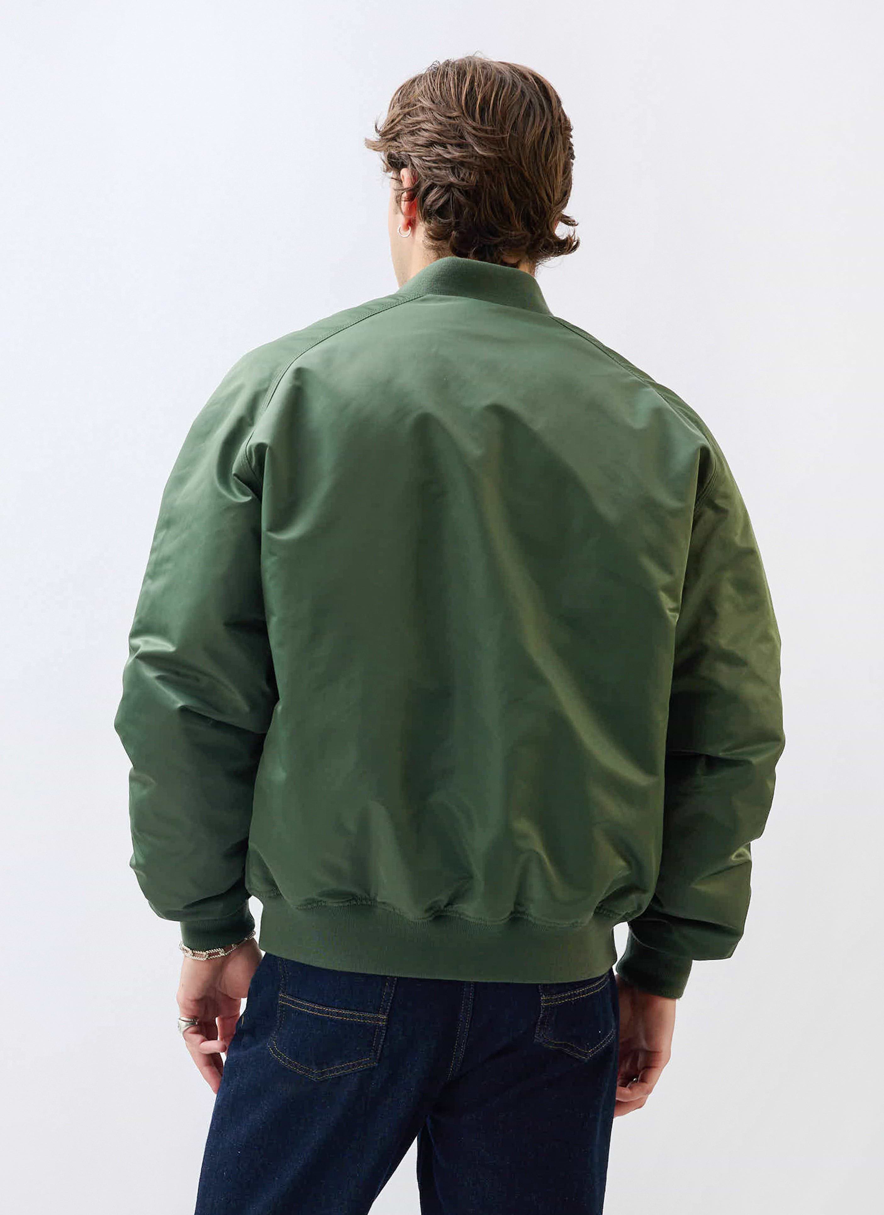 A model wears the Percival Bomber Jacket in Forest green, shot from behind to show the fit of the jacket.