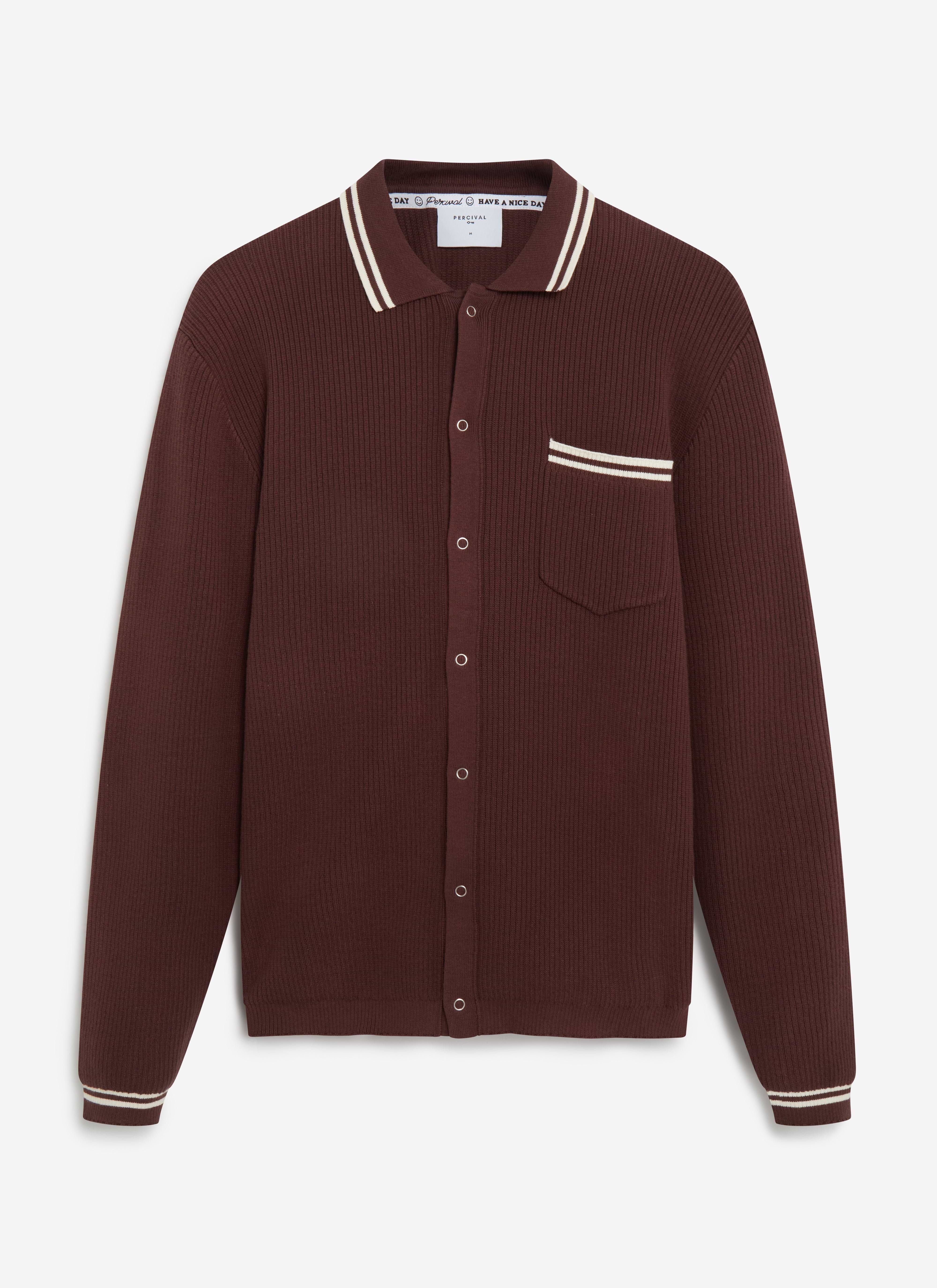 A flat lay of the Percival Pablo long sleeve knit shirt in espresso with white striped details on collar, cuffs and pocket.