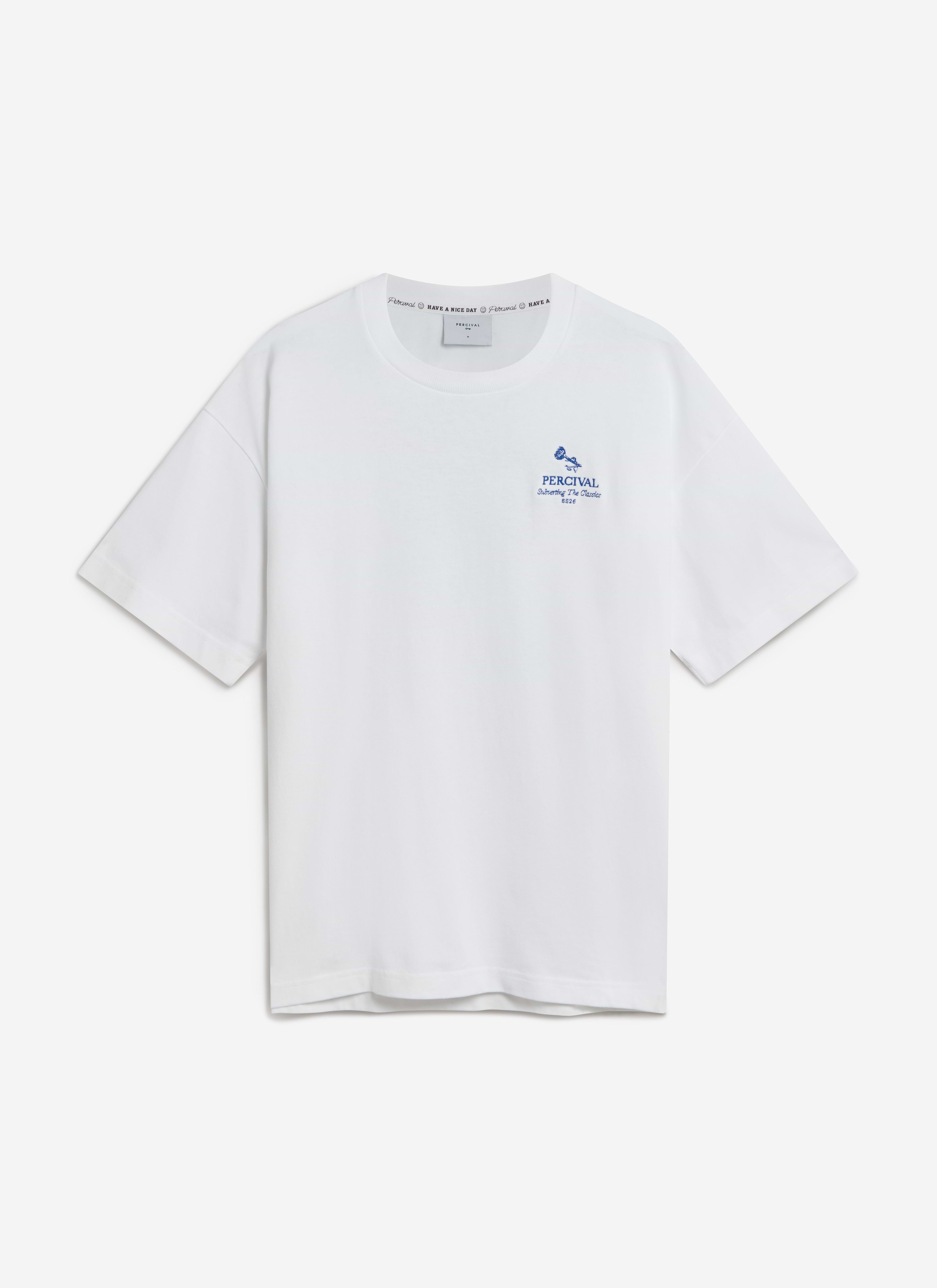 A flat lay of the Percival Smith Floral Oversized T-Shirt in white organic cotton, showing the blue embroidered chest logo.