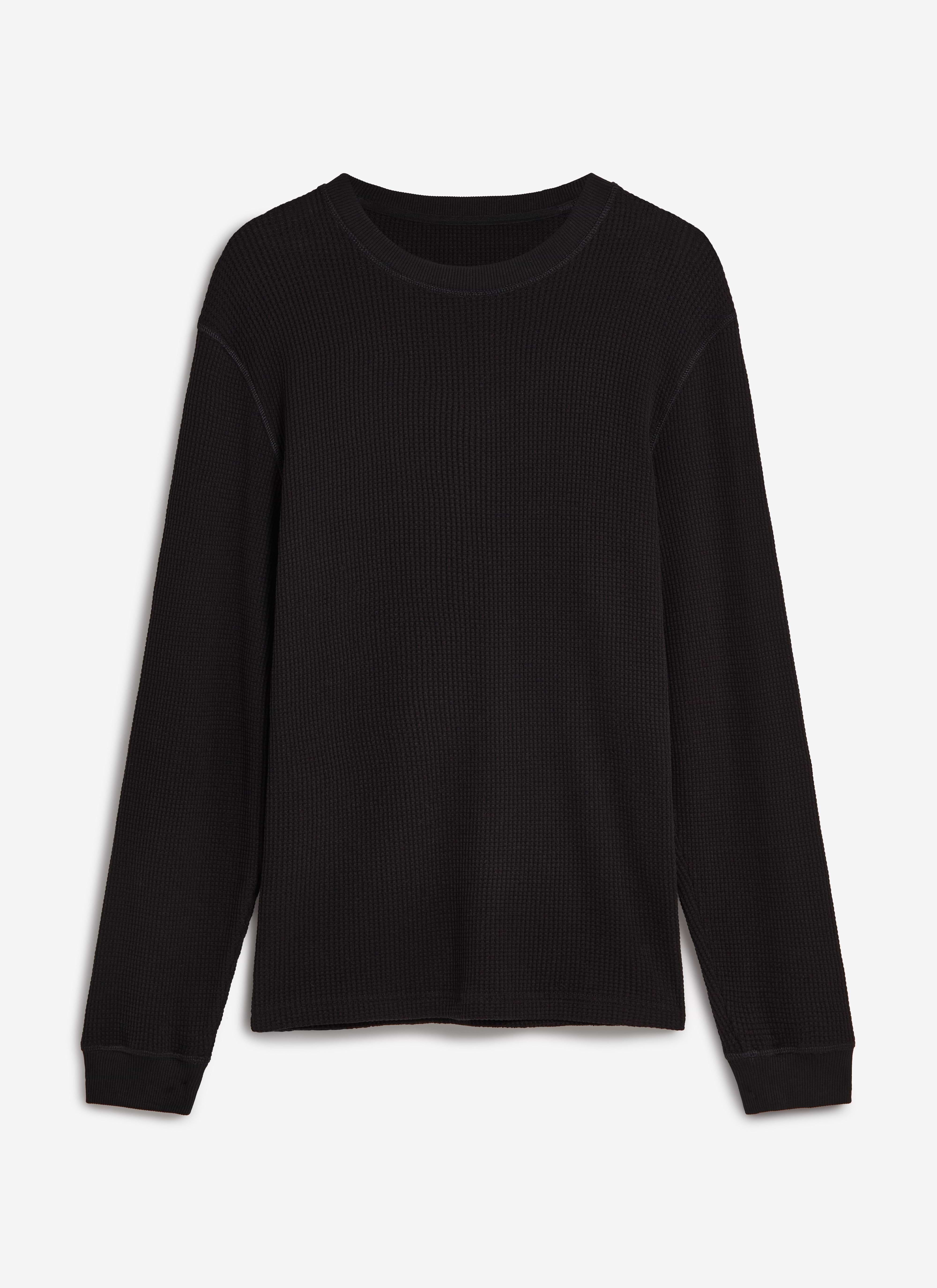 A flat lay of the Percival Waffle Long Sleeve T-Shirt in black, showing the textured organic cotton fabric.