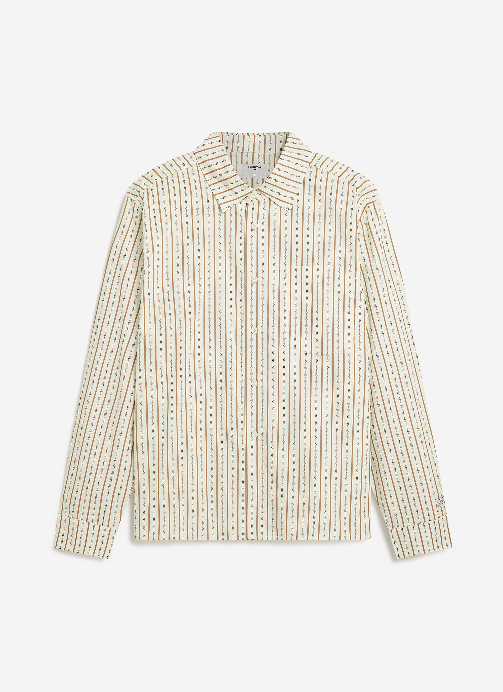 A flat lay of the Percival Binding Oversized Pearce Shirt in ecru cotton, showing the all-over stripe and motif print.