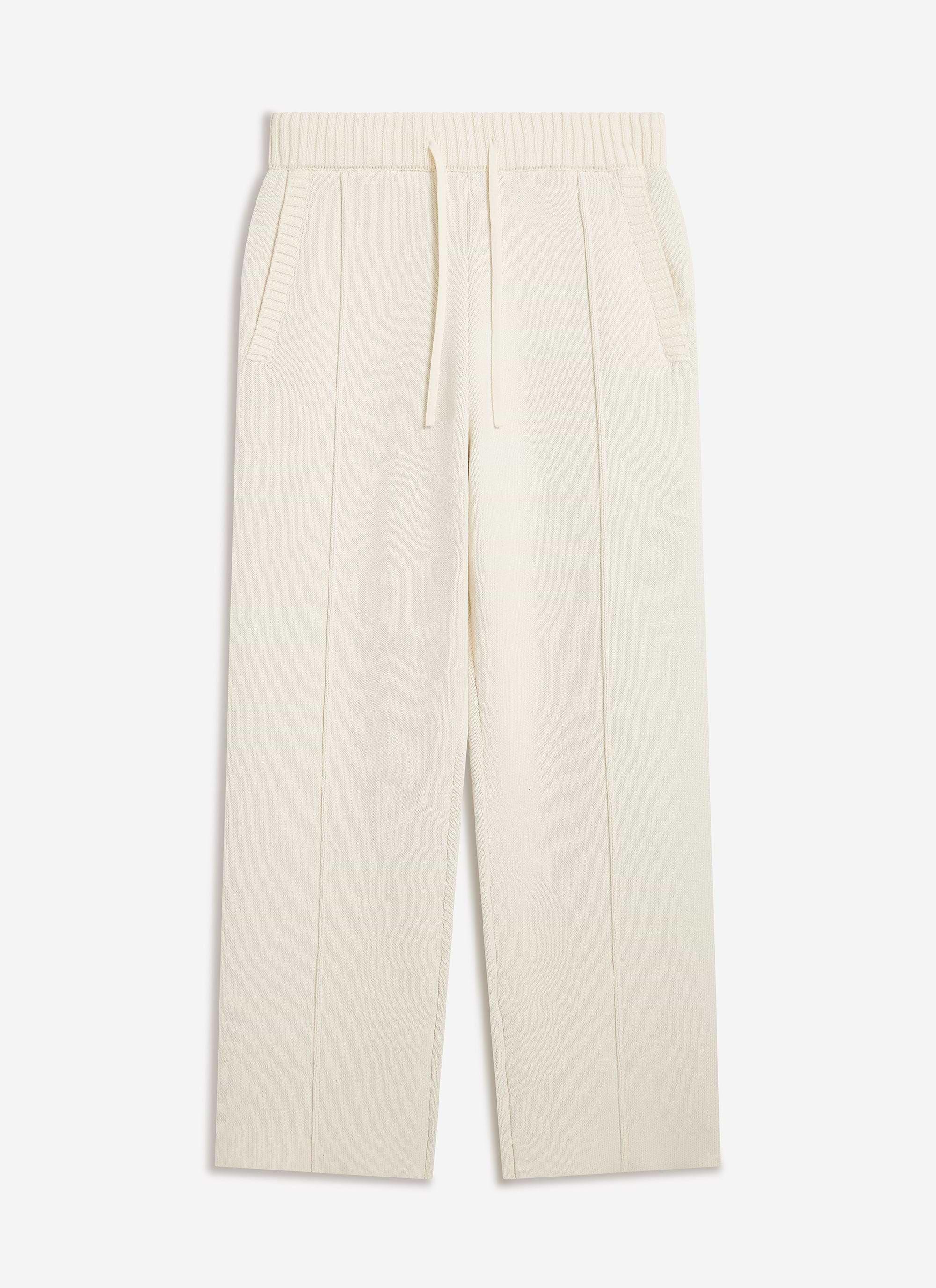 The Percival Chronicle Knitted Straight Leg Trackpant in ecru cotton, shot flat against a white background.