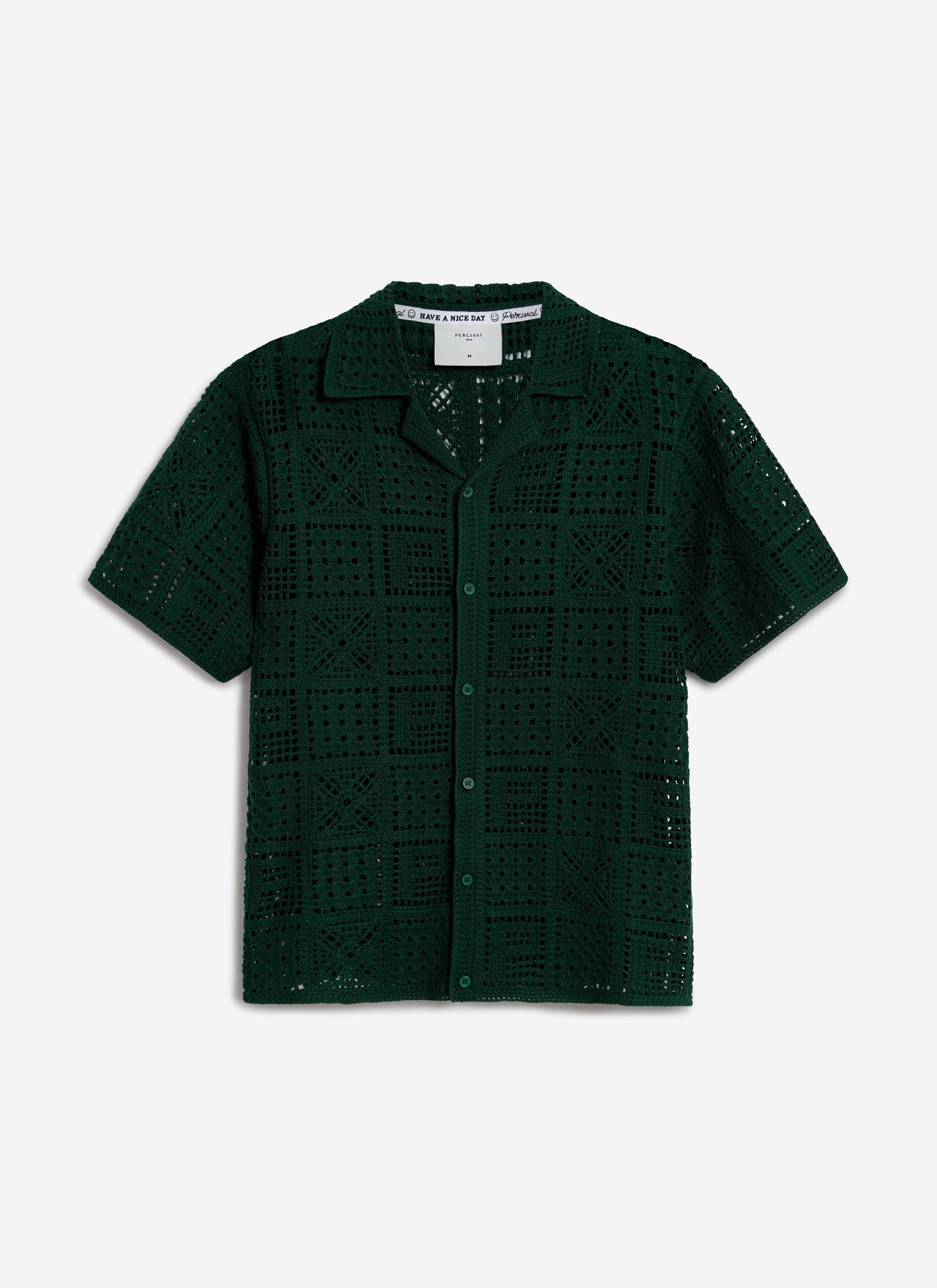 A flat lay of the Percival Crochet Groundsman Shirt in forest green, showing its cotton crochet knit and Cuban collar.