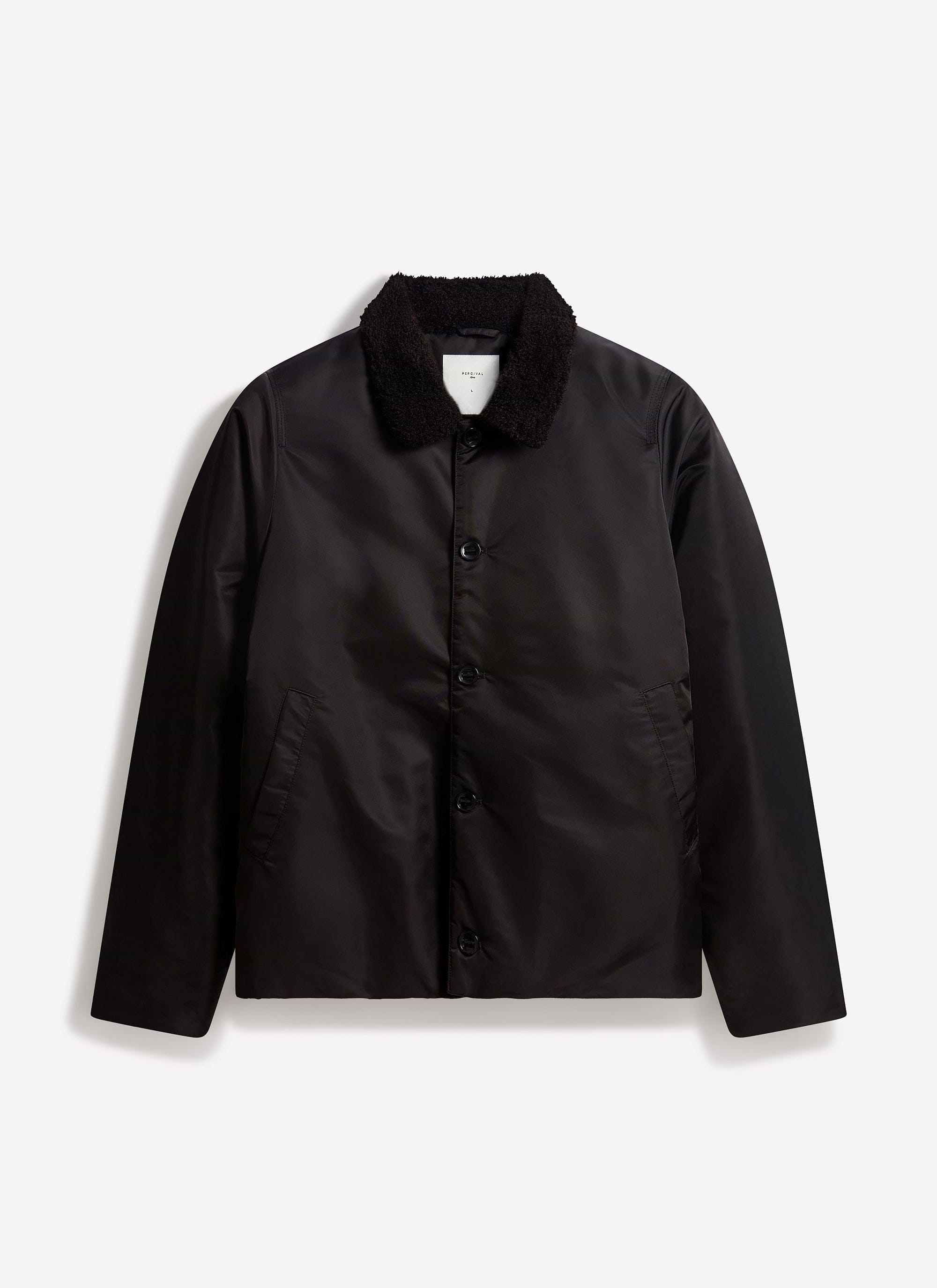 The Percival Doppio Bomber Jacket in black nylon, with a faux shearling collar, shot flat against a white background.