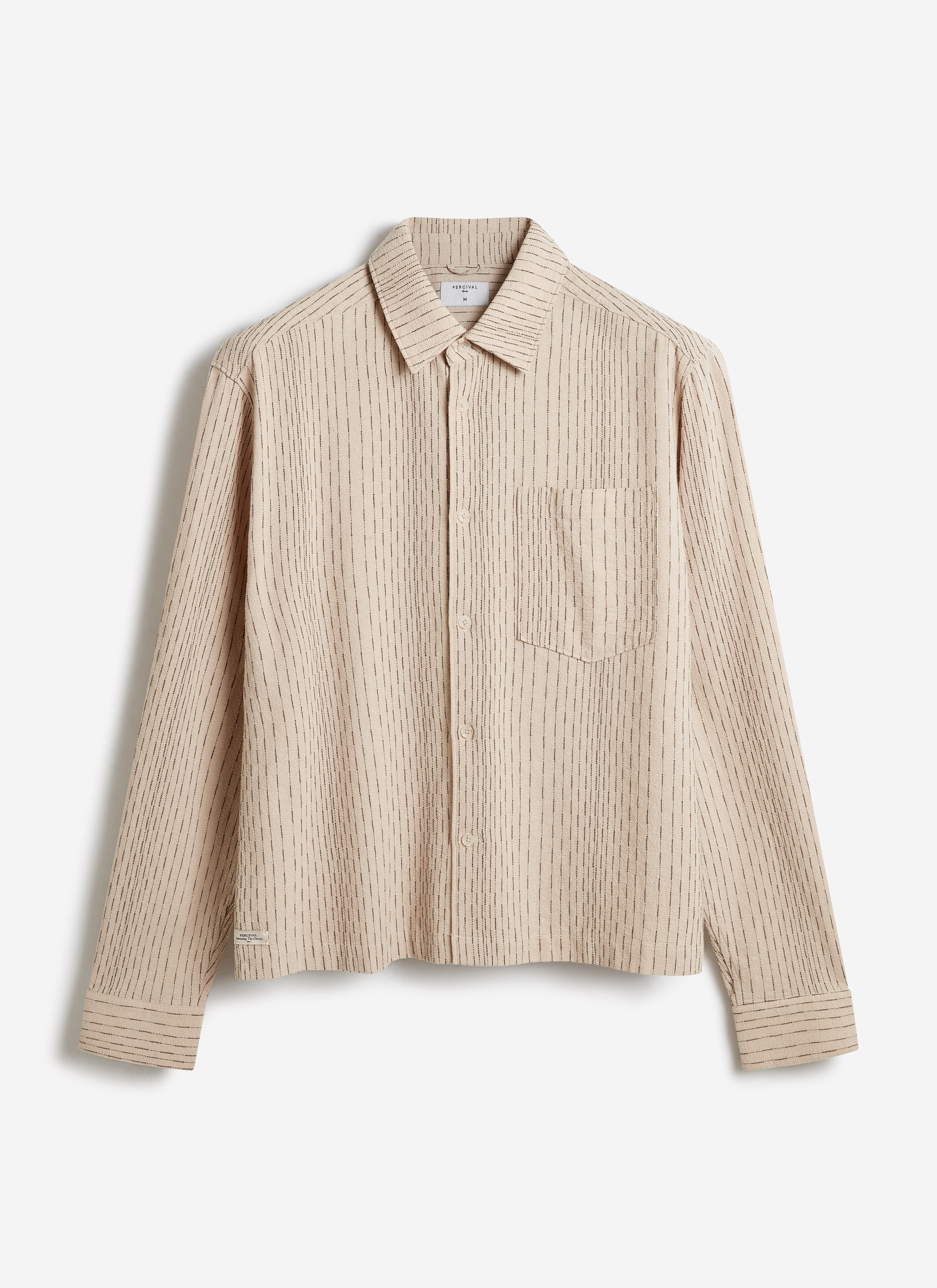 Percival Leland Cuban Boxy Long Sleeve Shirt in ecru cotton, featuring a vertical stripe texture and chest pocket.
