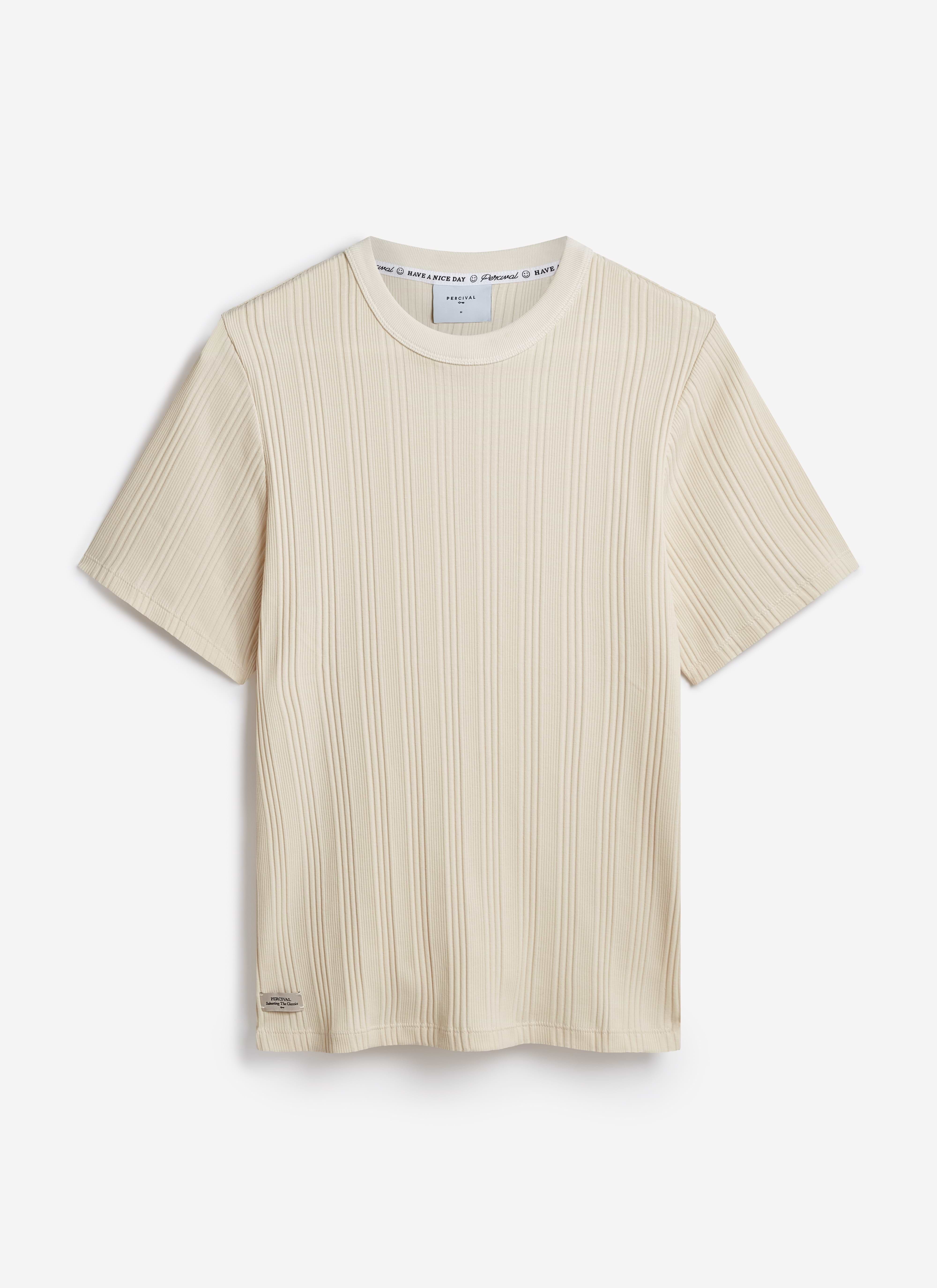 The Percival Leon slim ribbed t-shirt in cream organic cotton, featuring fine vertical ribs and a crew neck.