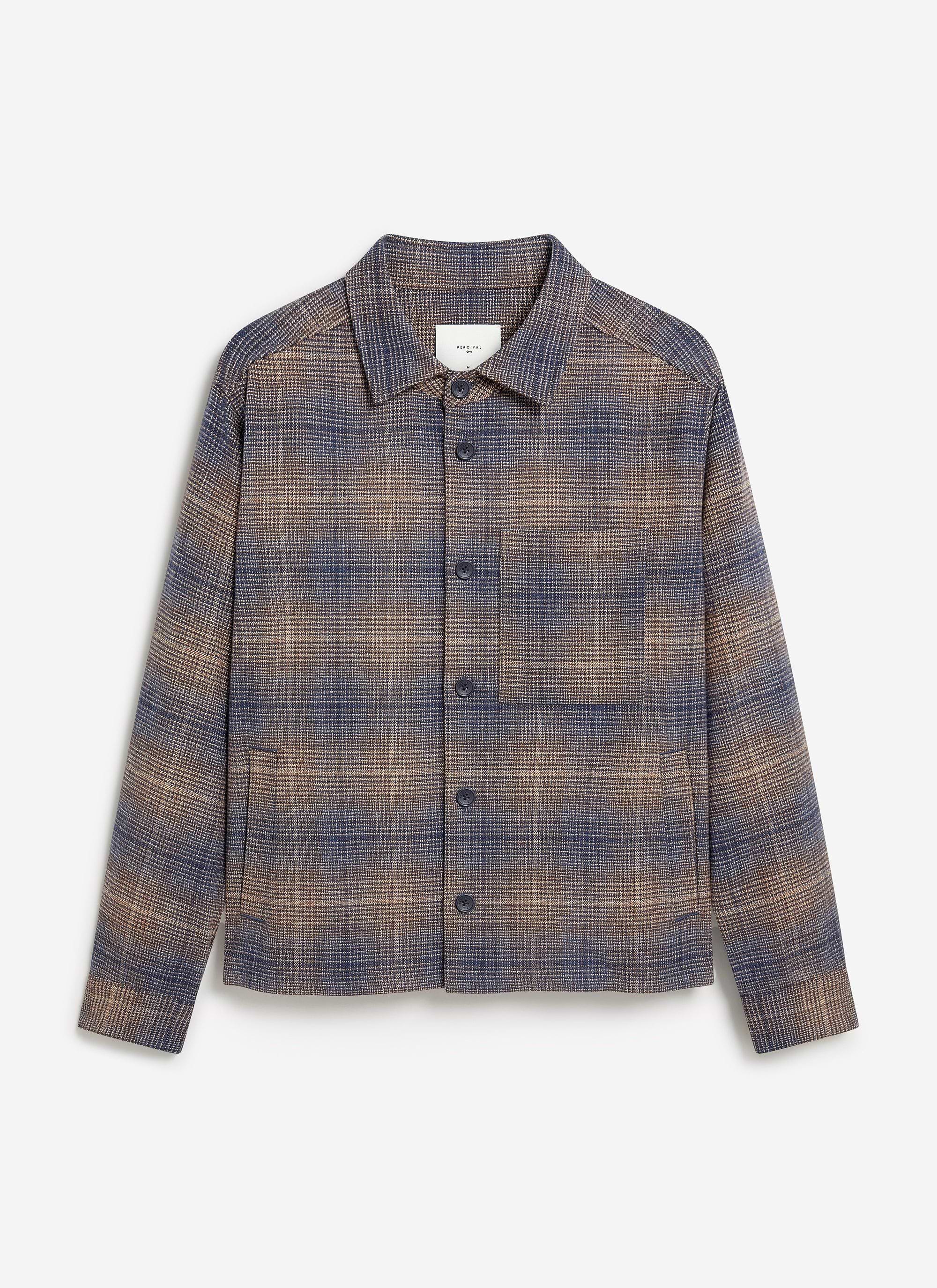 A studio shot of the Percival Luton Check Overshirt, showcasing its brown and blue brushed cotton check pattern.