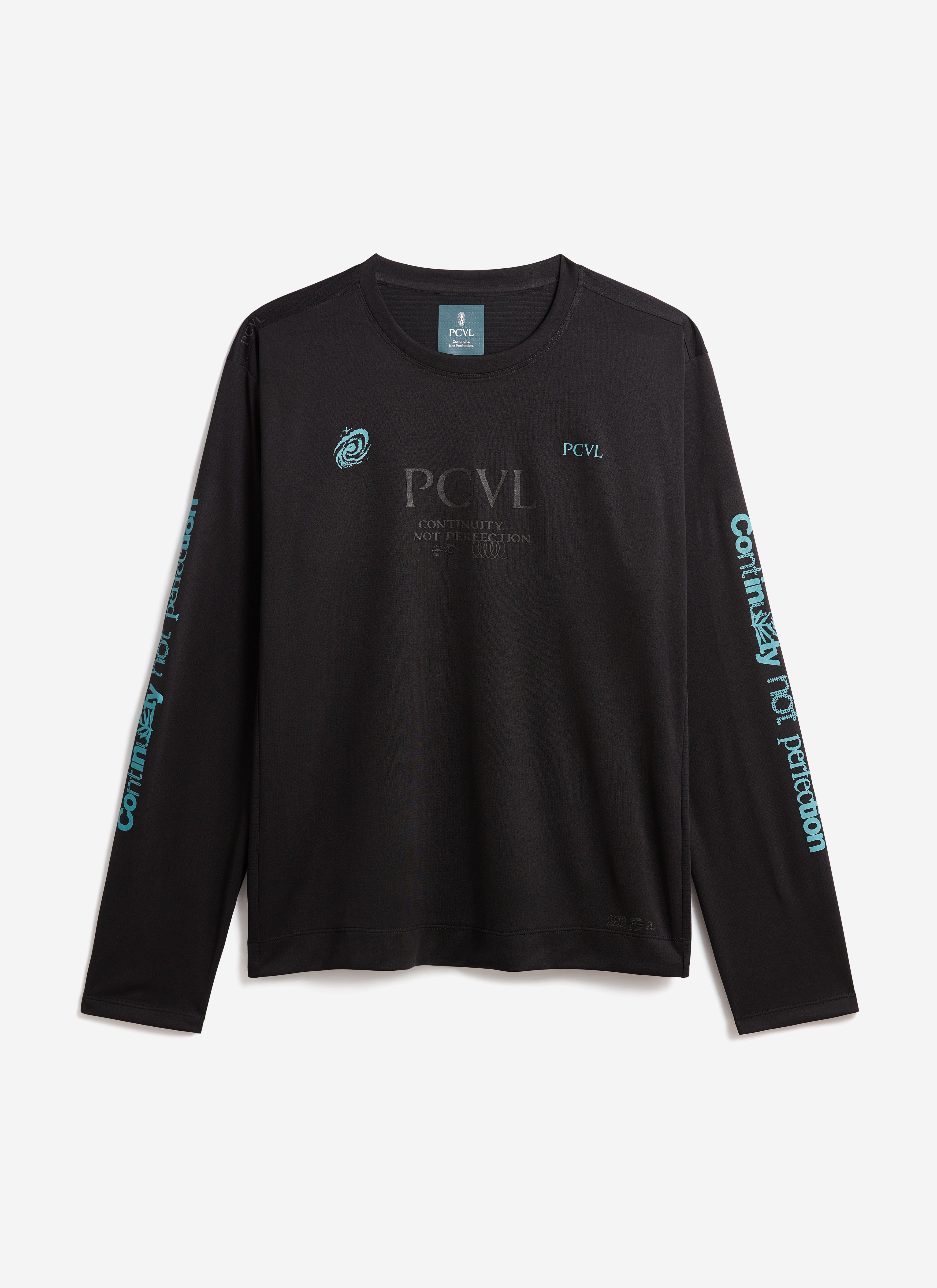 A flat lay of the Percival PCVL Long Sleeve Performance Top in black, showing the tonal chest print and turquoise graphics.