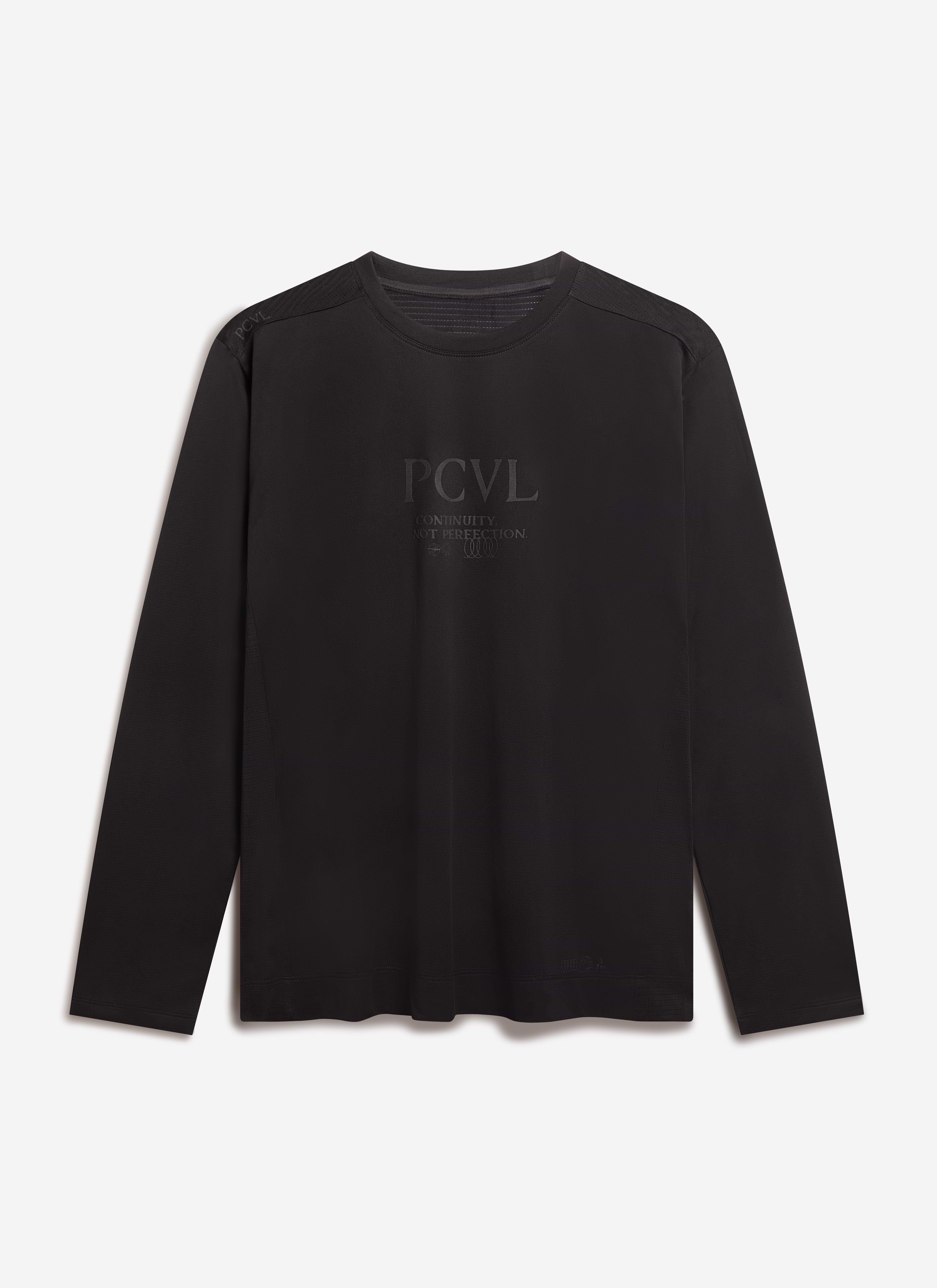 The Percival PCVL Long Sleeve Performance Top in black, shot flat against a white background, showing the tonal chest logo.