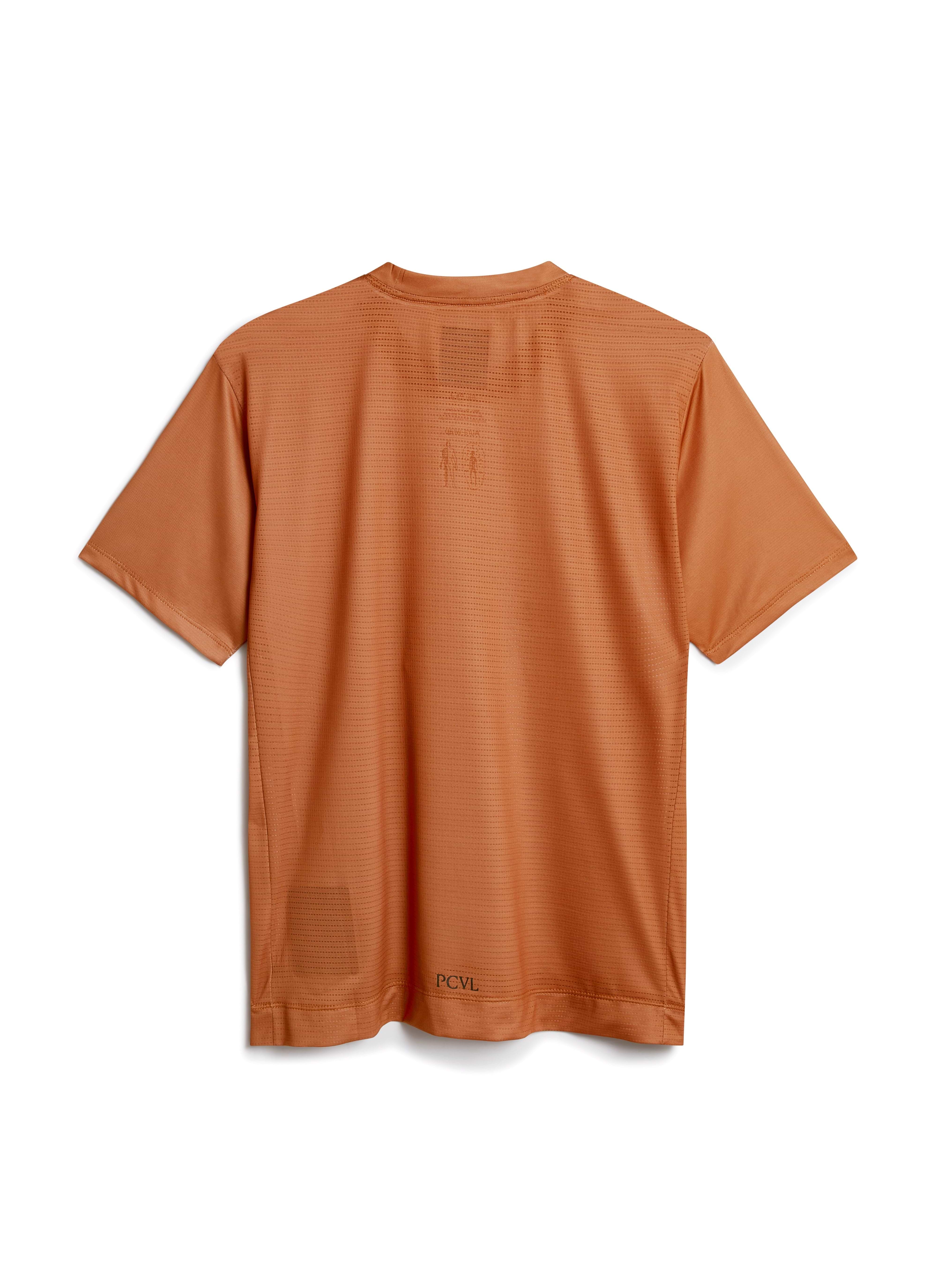 Back view of the Percival PCVL Printed Performance Top in rust, laid flat to show the breathable mesh fabric and logo detail.