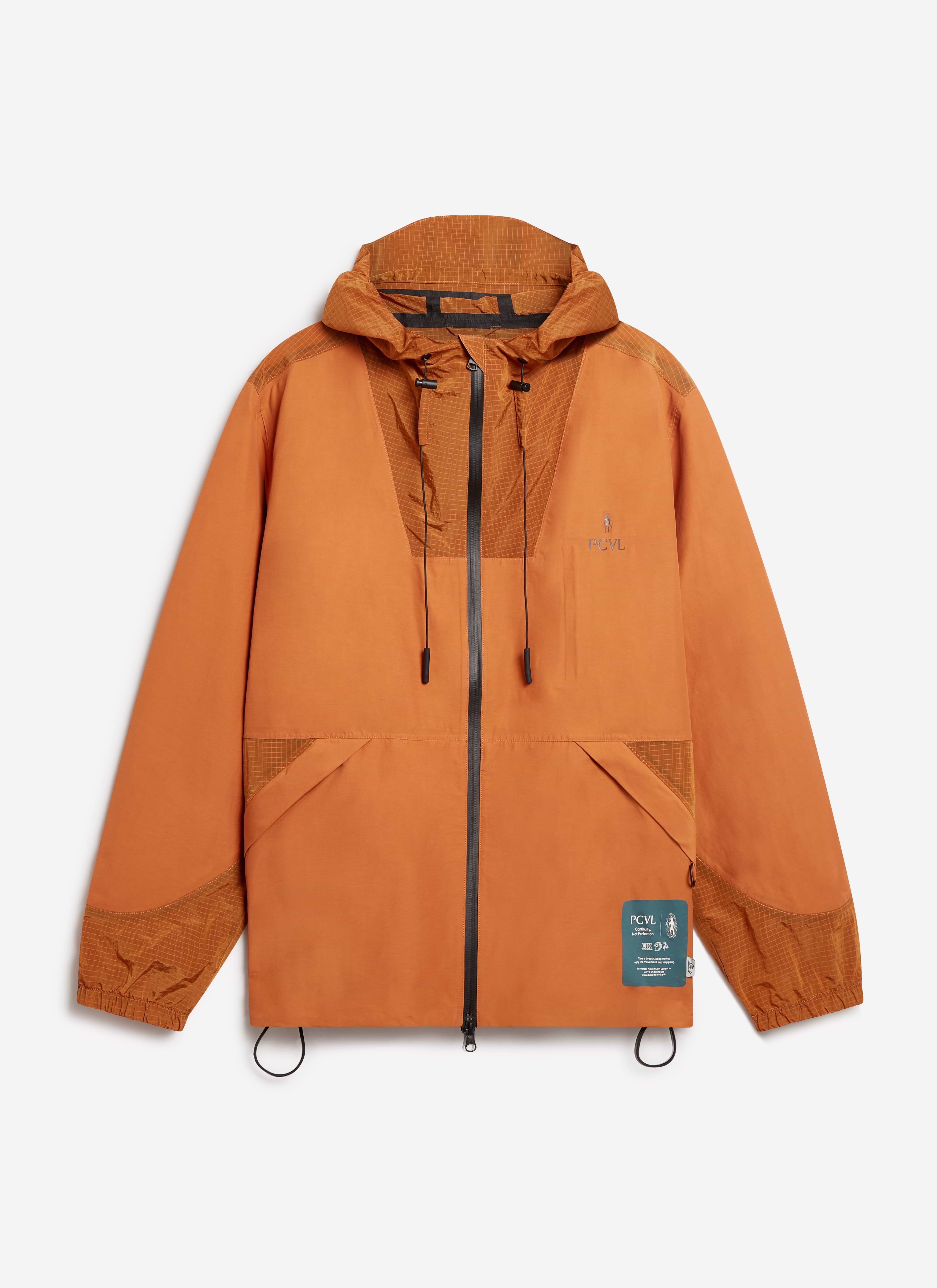A flat lay of the Percival PCVL Zip Through Water Resistant Jacket in rust, with adjustable hood and contrast panelling.