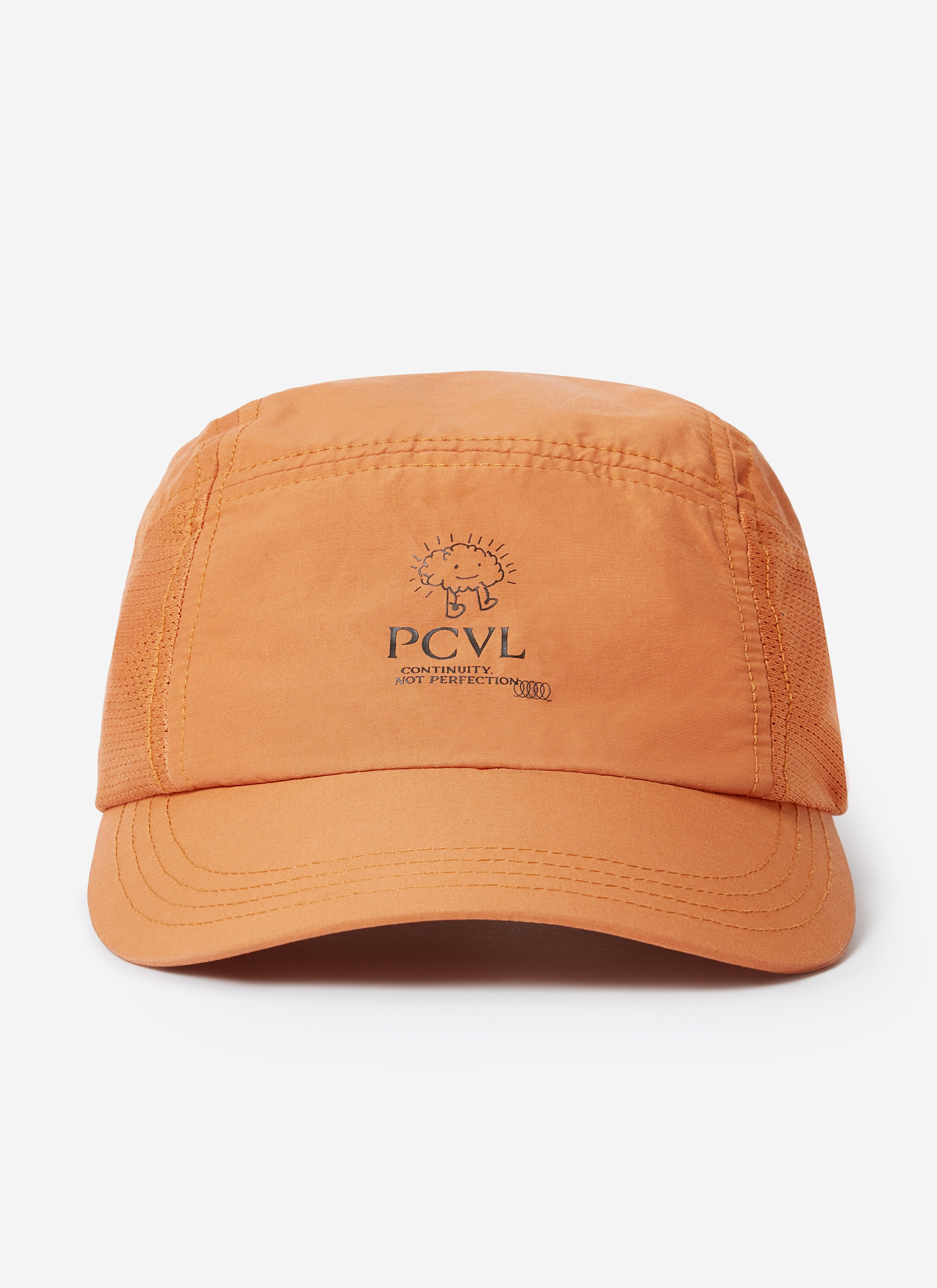 A front-on studio shot of the PCVL Nylon Cap in rust by Percival, showing the embroidered logo on the front.