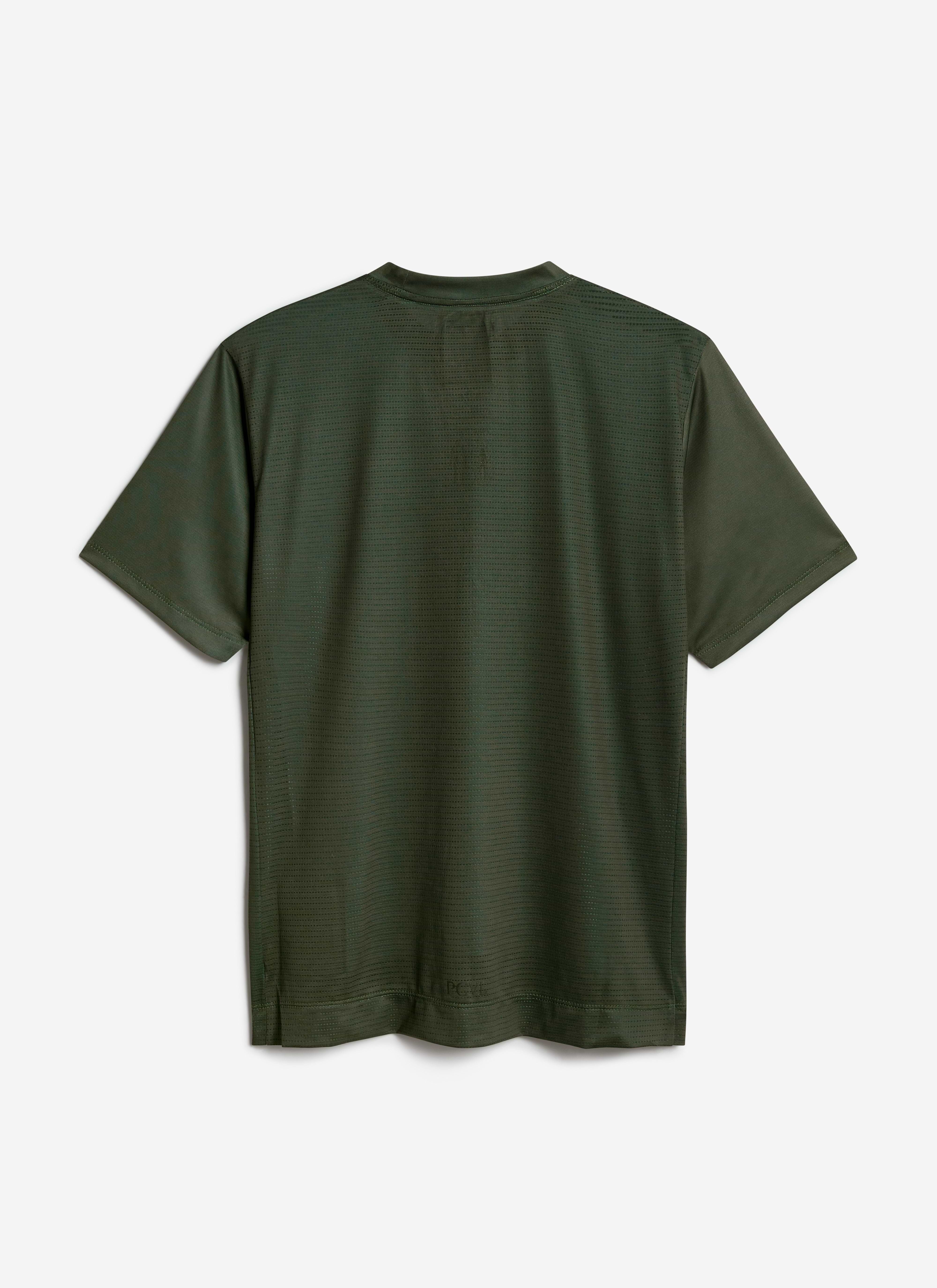 Flat lay of the back of the Percival PCVL Printed Performance Top in forest green, showing its breathable perforated fabric.