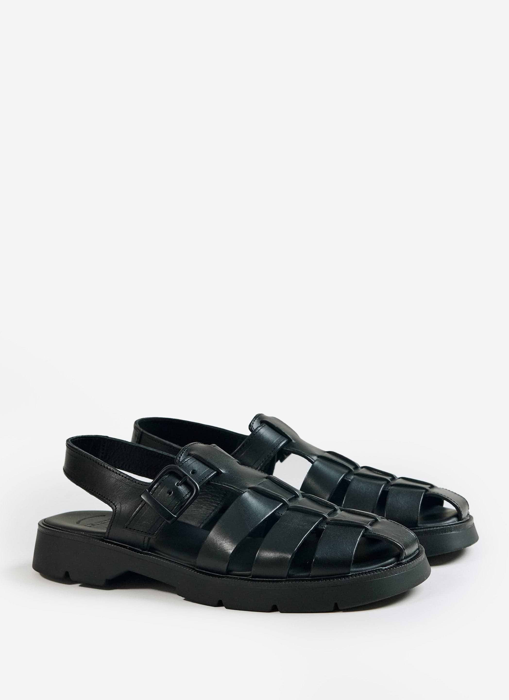 A pair of black Kleman Babord VGT fisherman sandals with a rugged lug sole and buckle strap, from Percival.