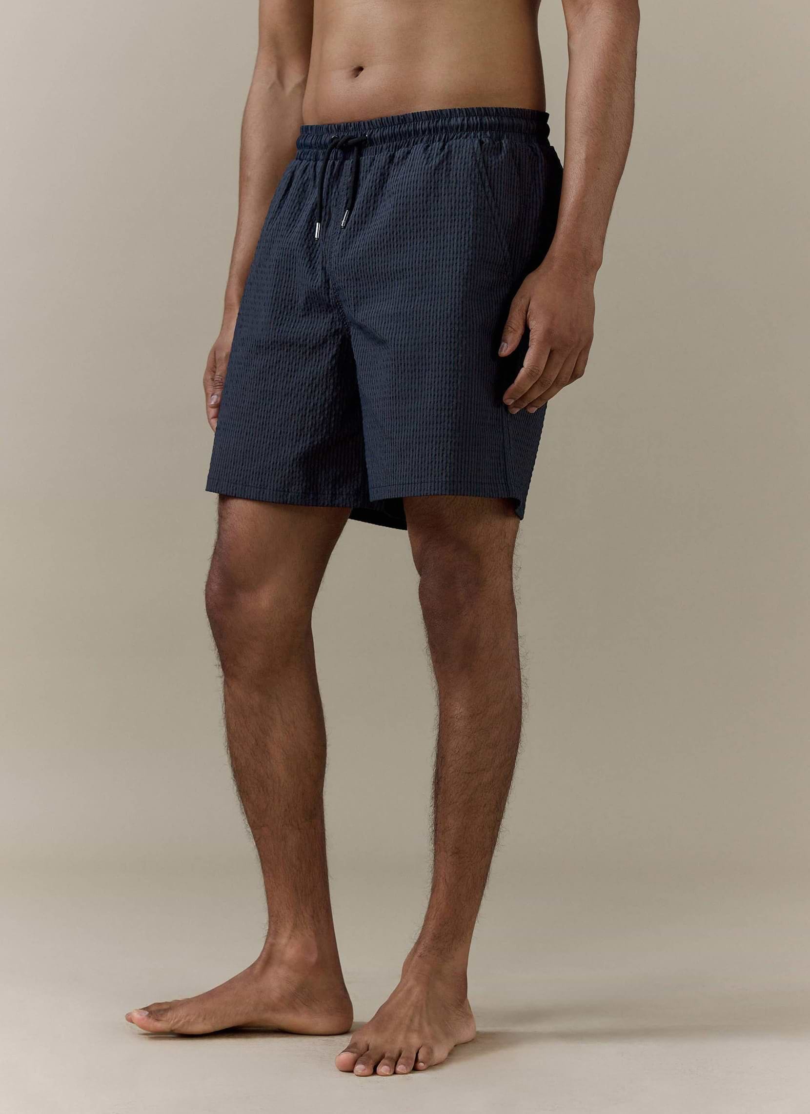 Percival navy stripe Rowan Seersucker Swim Shorts featuring a drawstring waist and textured cotton-blend fabric.