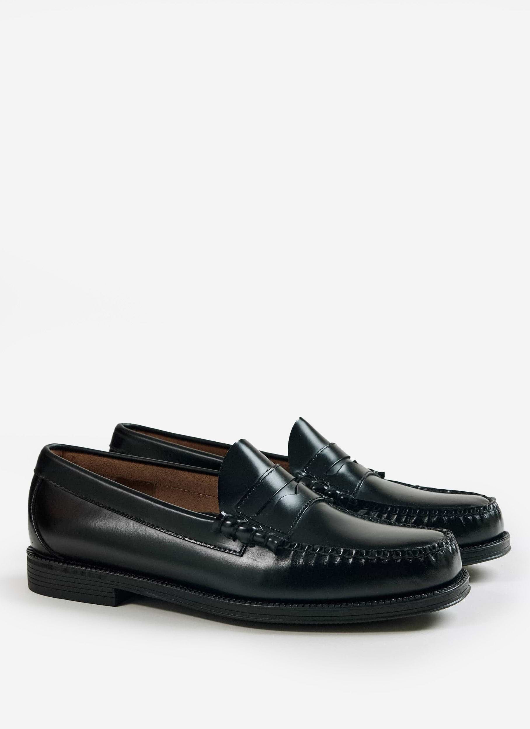 A pair of G.H. Bass Weejun II Larson Moc Penny loafers in black polished leather from Percival.