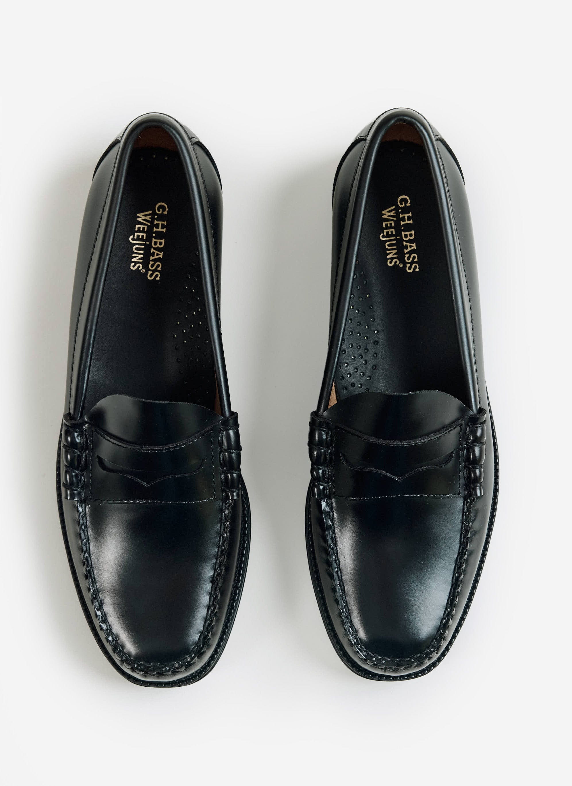 A top-down view of the black leather G.H. Bass Weejun II Larson Moc Penny loafers, available at Percival.