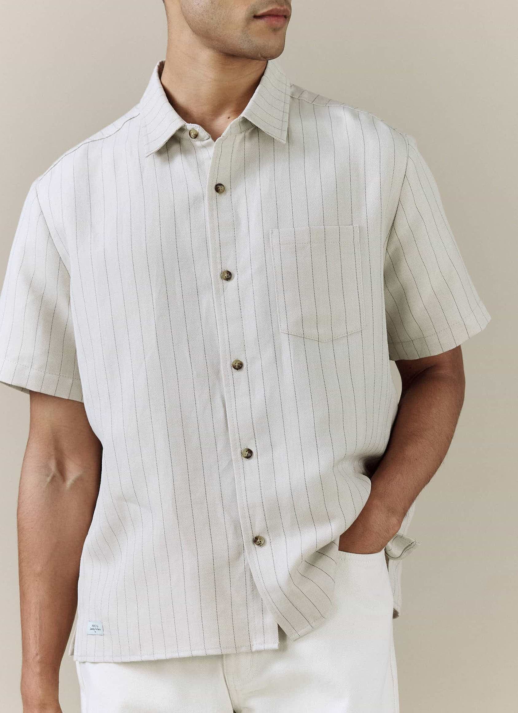 Percival Striped Boxy Shirt in cream linen blend, featuring subtle pinstripes and a herringbone weave.
