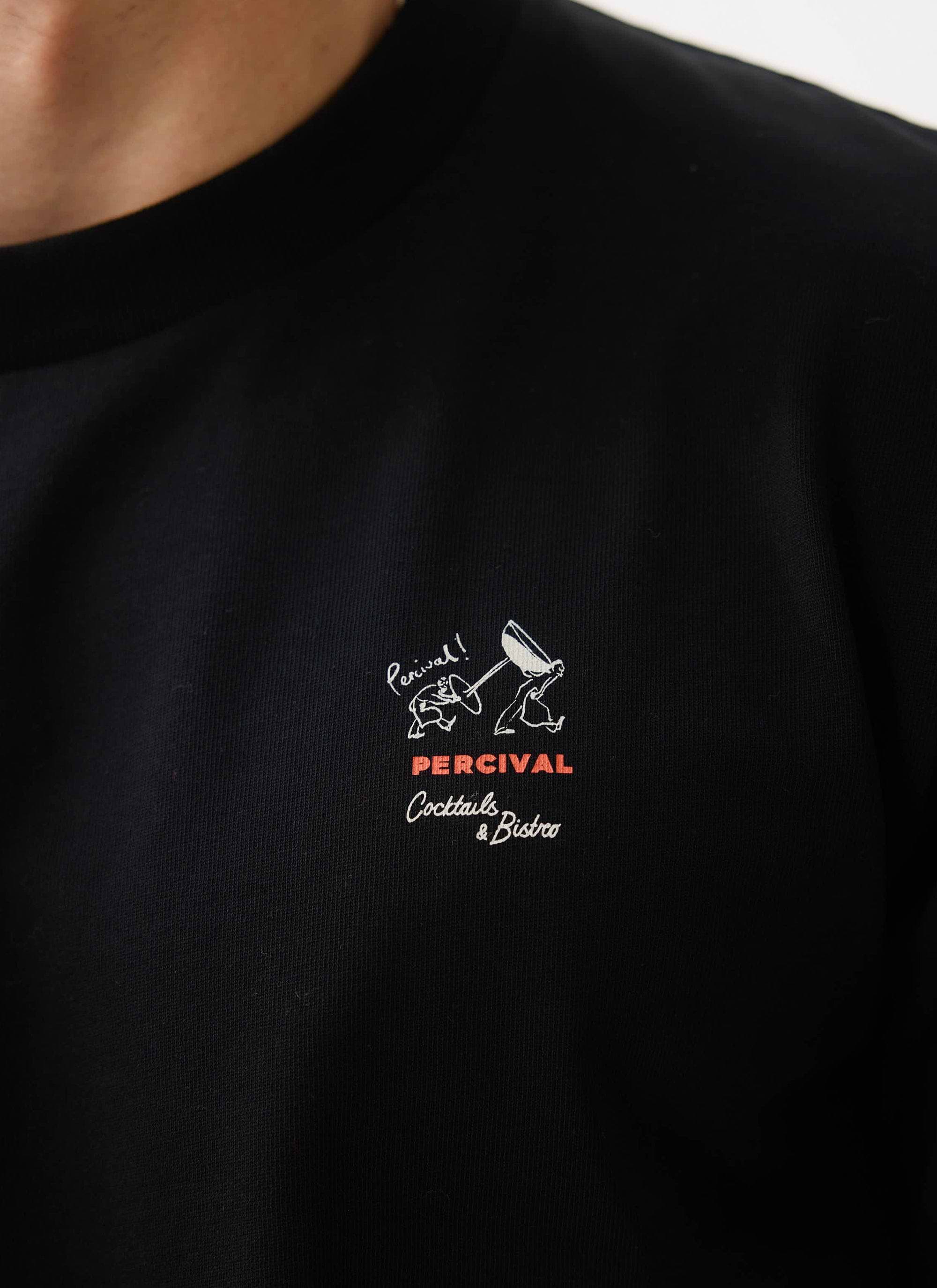 A close-up of the 'Cocktails & Bistro' embroidery on the chest of the black À La Carte t-shirt by Percival.