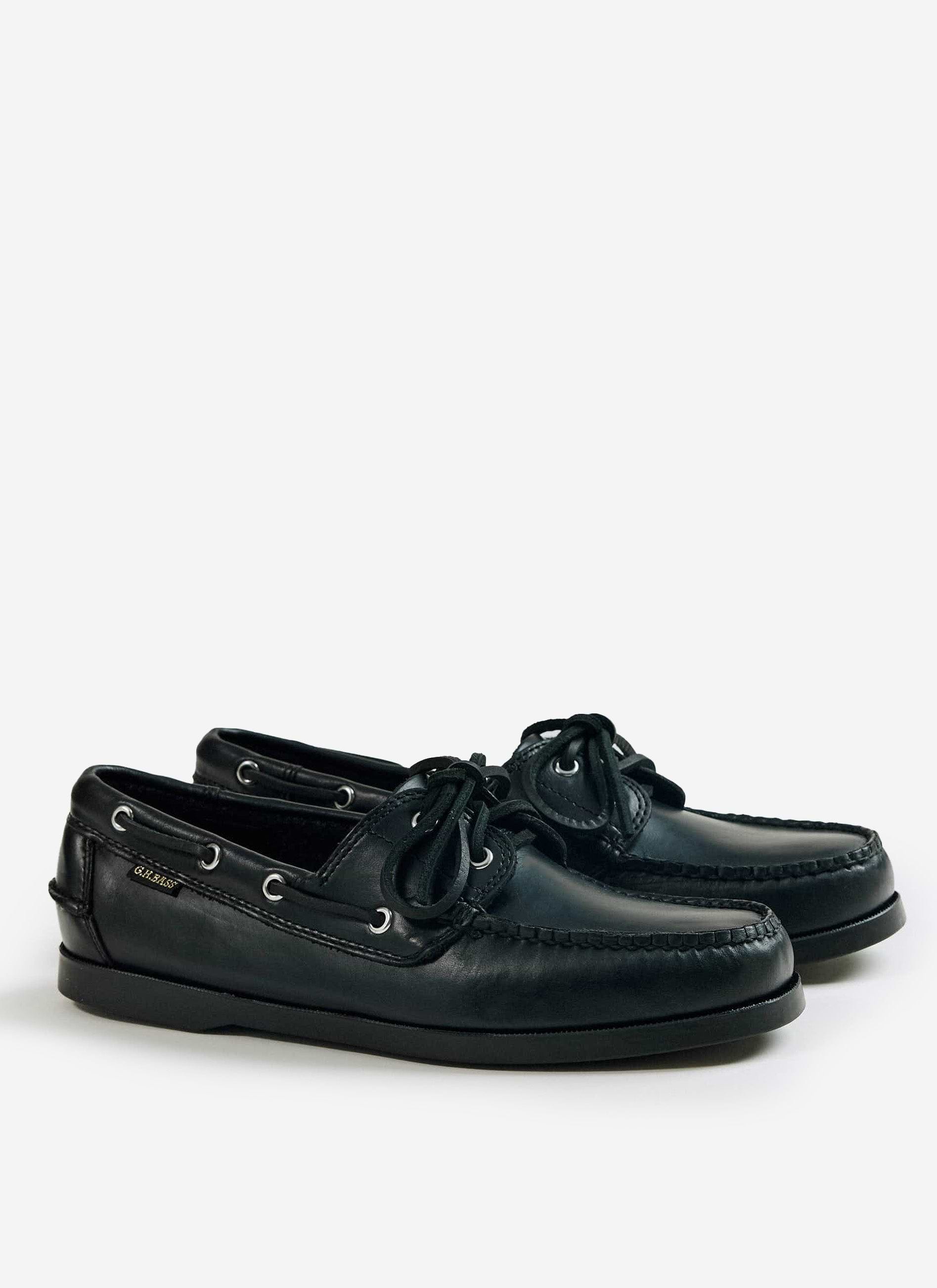 A side view of the black leather G.H. Bass Jetty II Boater 2 Eye shoes from Percival.