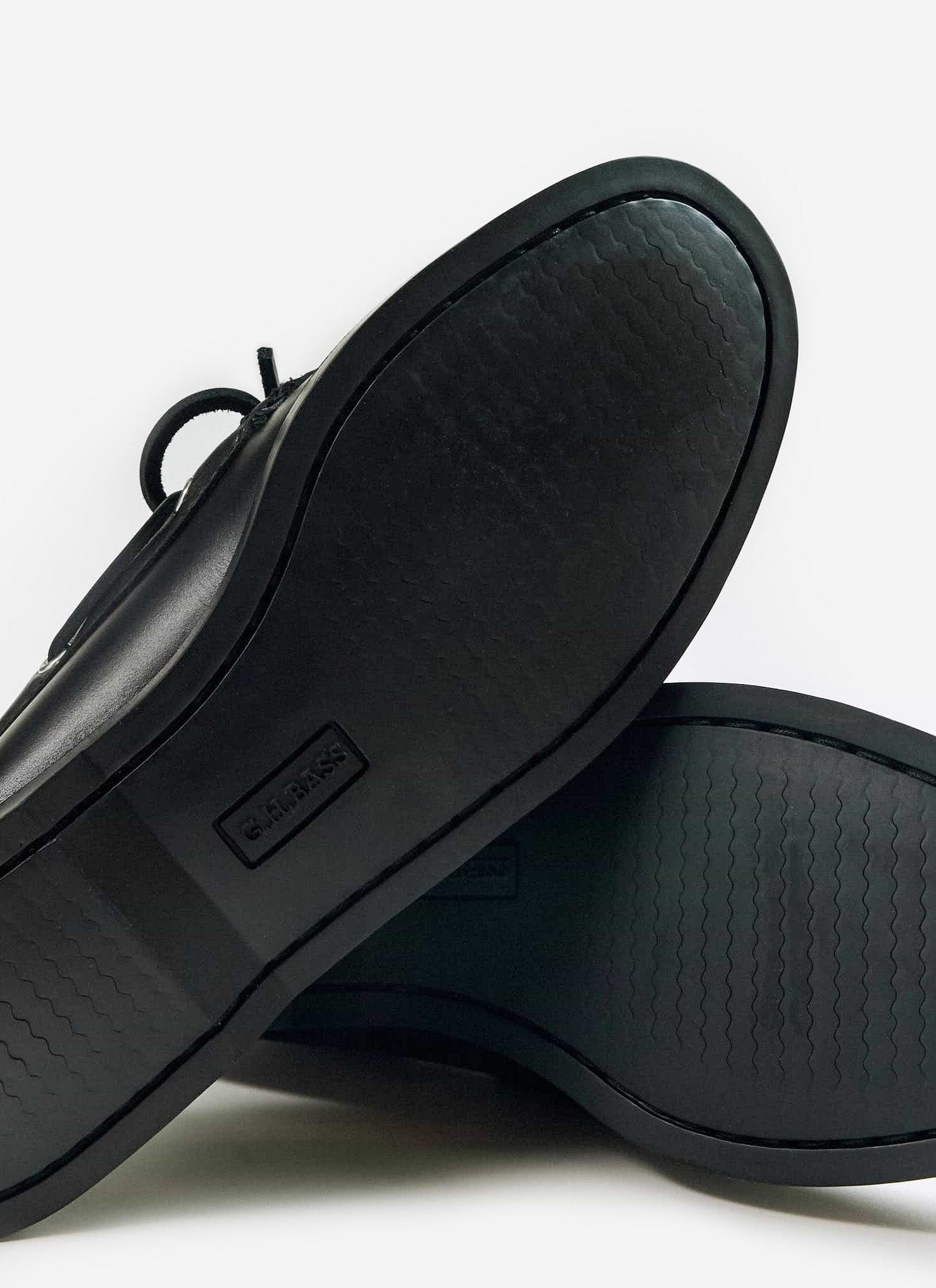 Close-up of the black rubber sole on the G.H. Bass Jetty II Boater 2 Eye shoe from Percival, showing the wavy grip pattern.