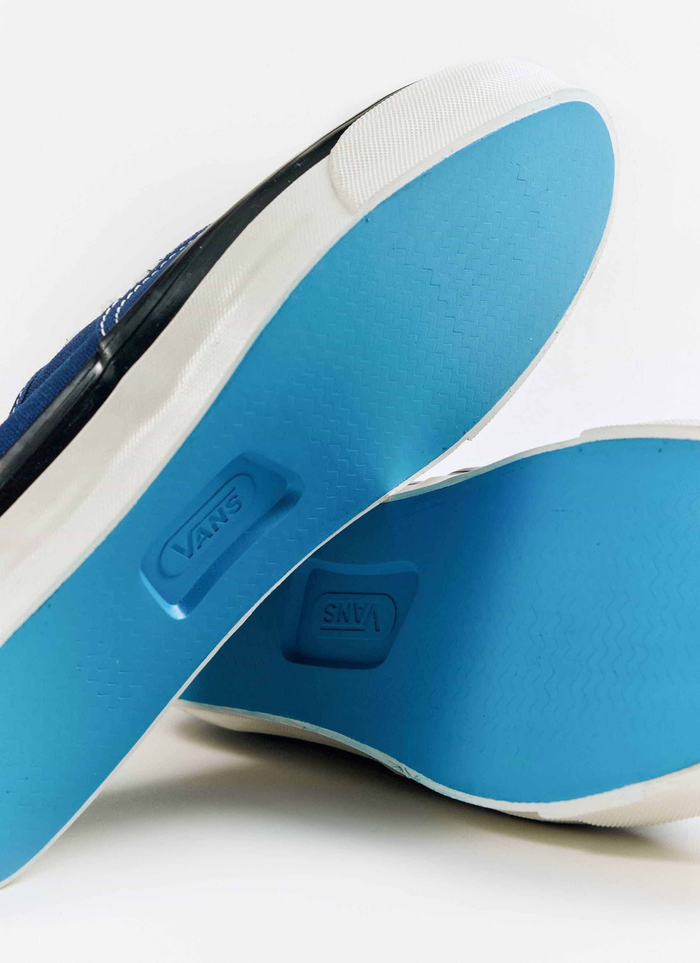 Close-up of the bright blue textured soles and Vans logo on the Premium Authentic 44 shoes, available from Percival.