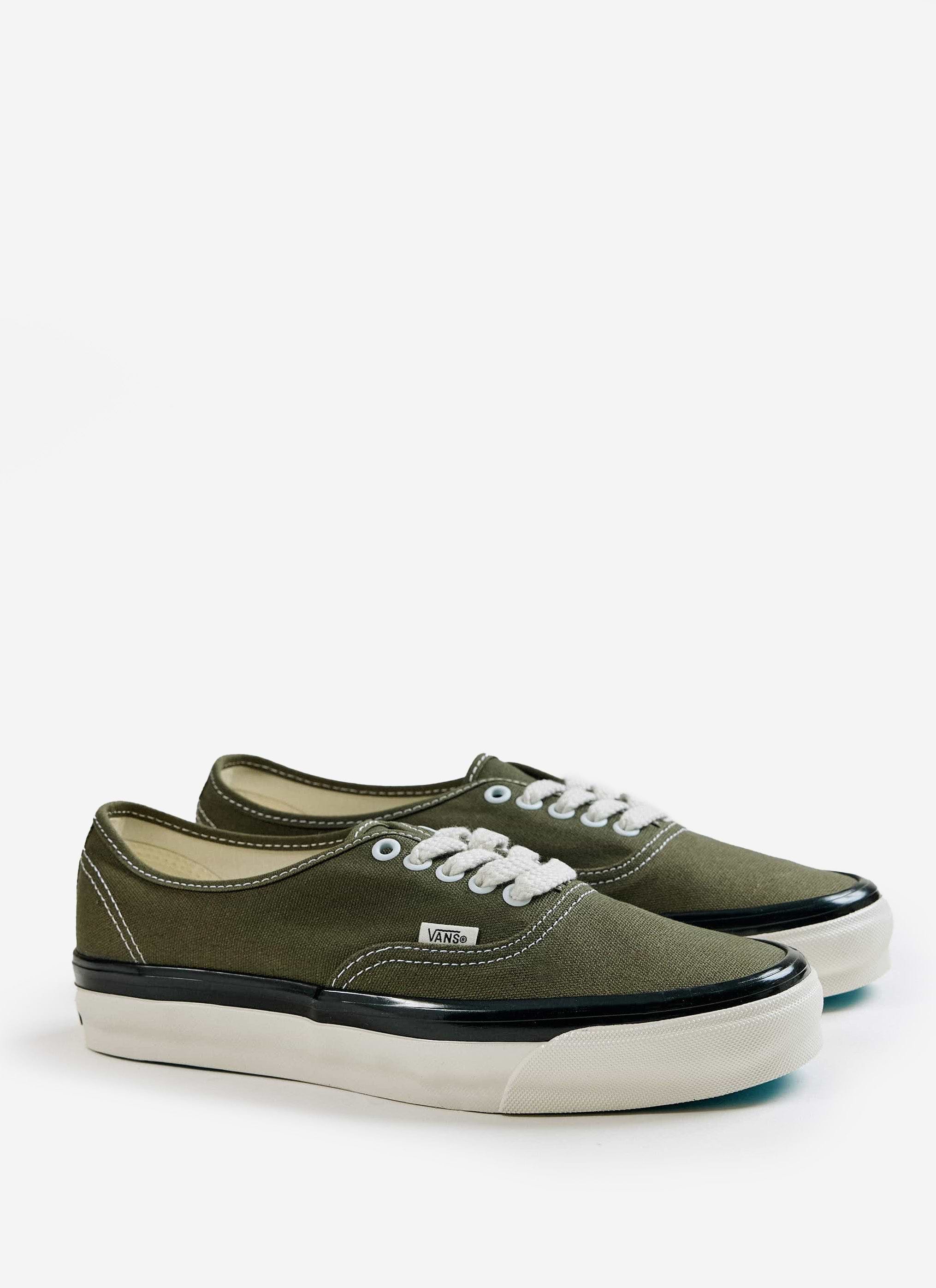 The olive green Vans Premium Authentic 44 Shoes with white laces and black foxing stripe, from Percival.
