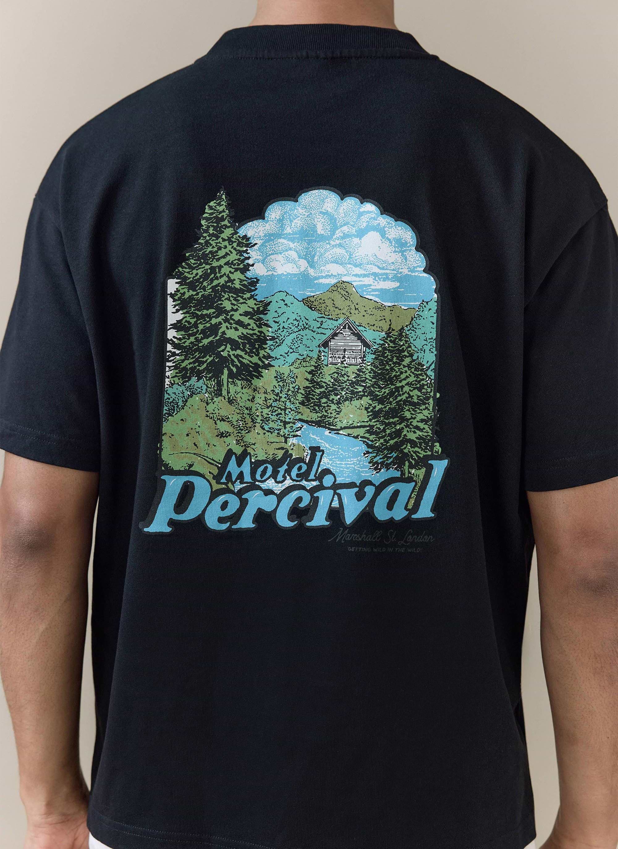 Percival Arnold Oversized T Shirt in black organic cotton, featuring a scenic 'Motel Percival' mountain back graphic.