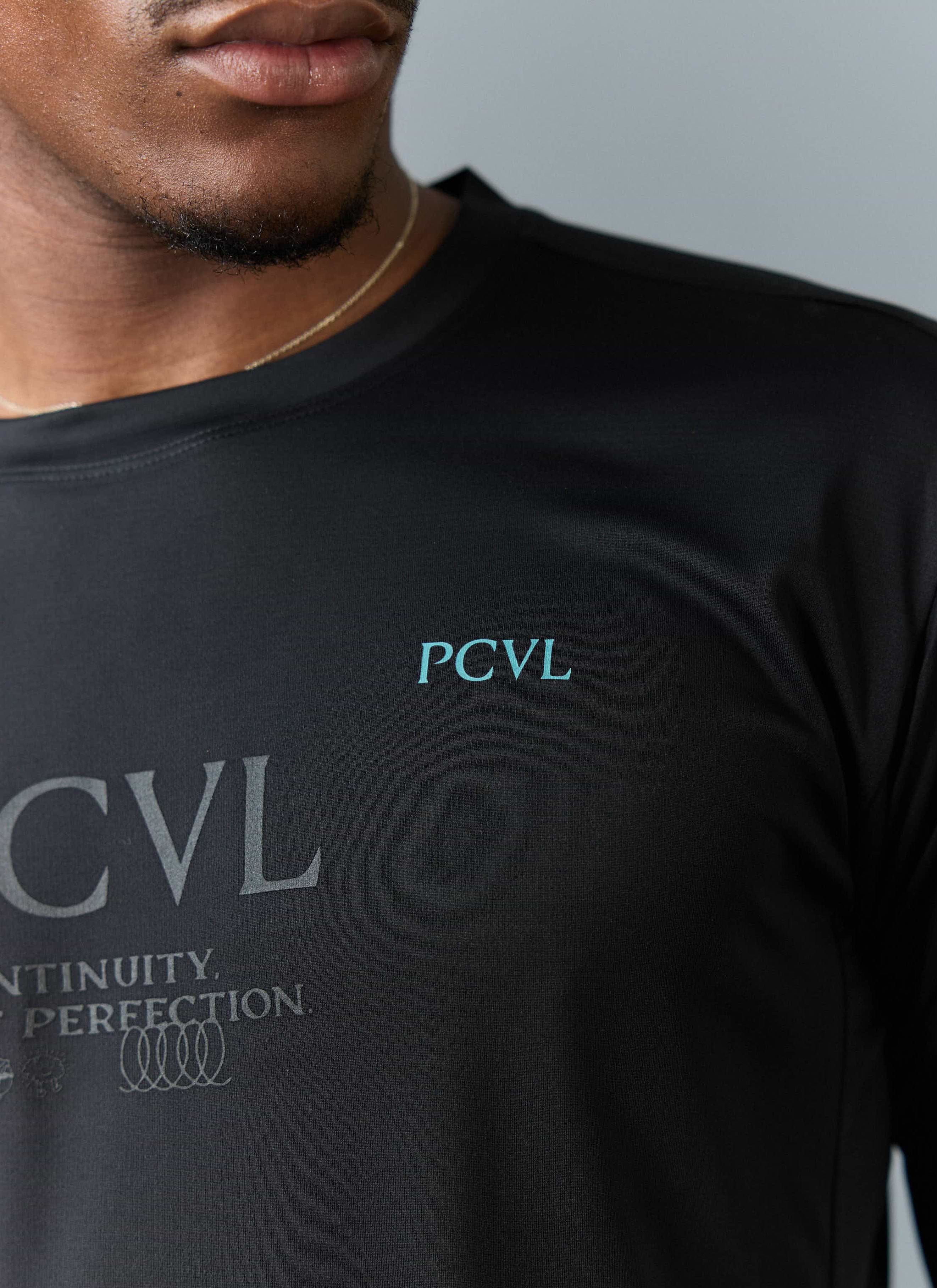 A close-up of the Percival PCVL Long Sleeve Printed Performance Top in black, detailing the teal and tonal chest graphics.