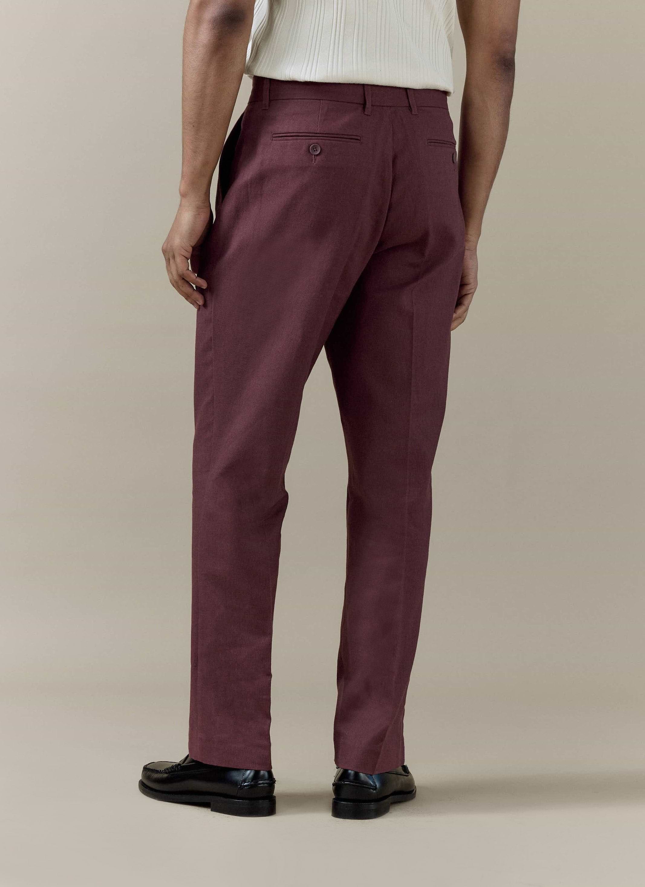 Merlot Percival tailored linen-cotton trousers seen from the back, showing the straight leg and pressed crease.