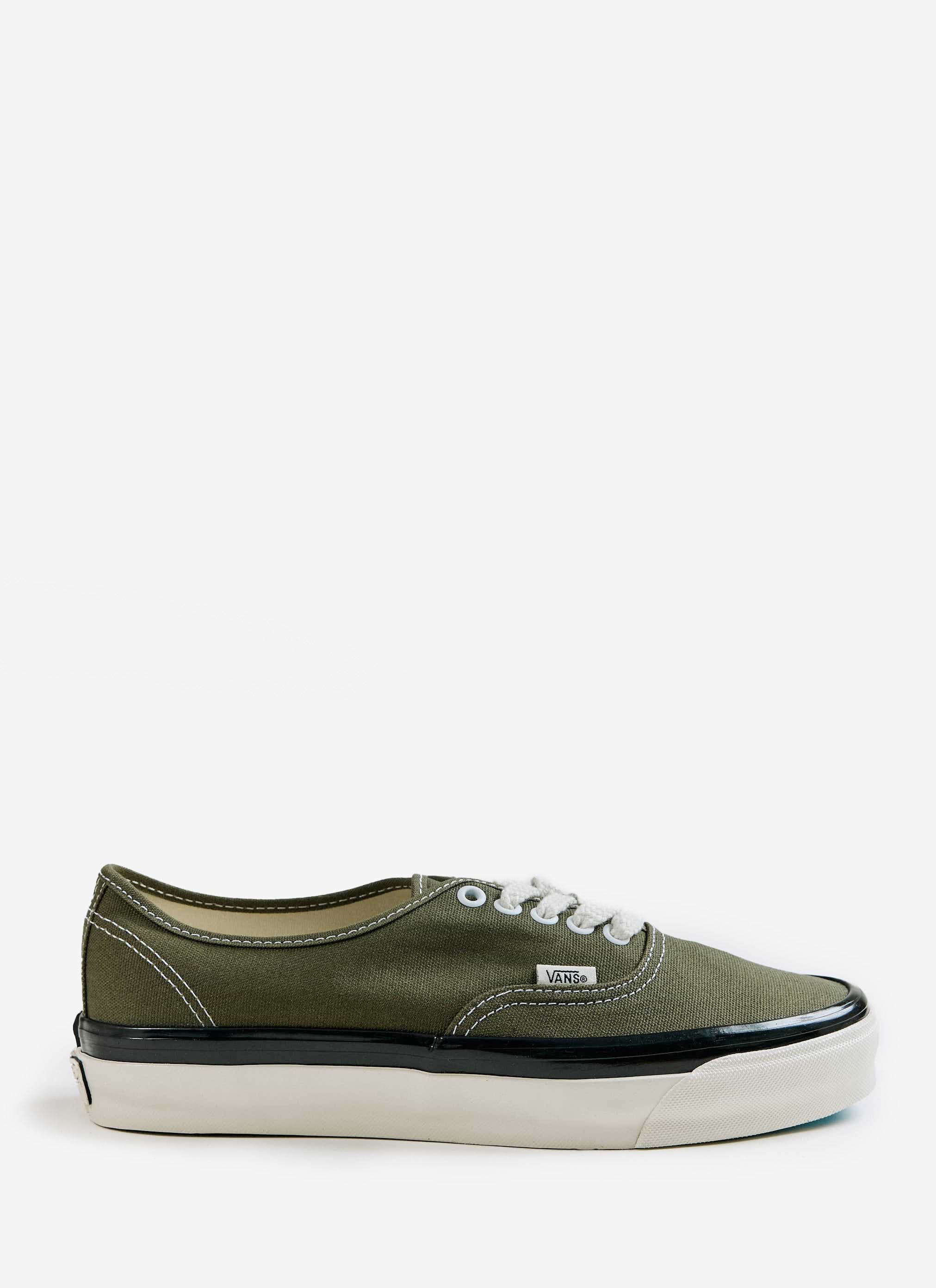 Side view of the Vans Premium Authentic 44 Shoes in olive canvas with white laces, available from Percival.