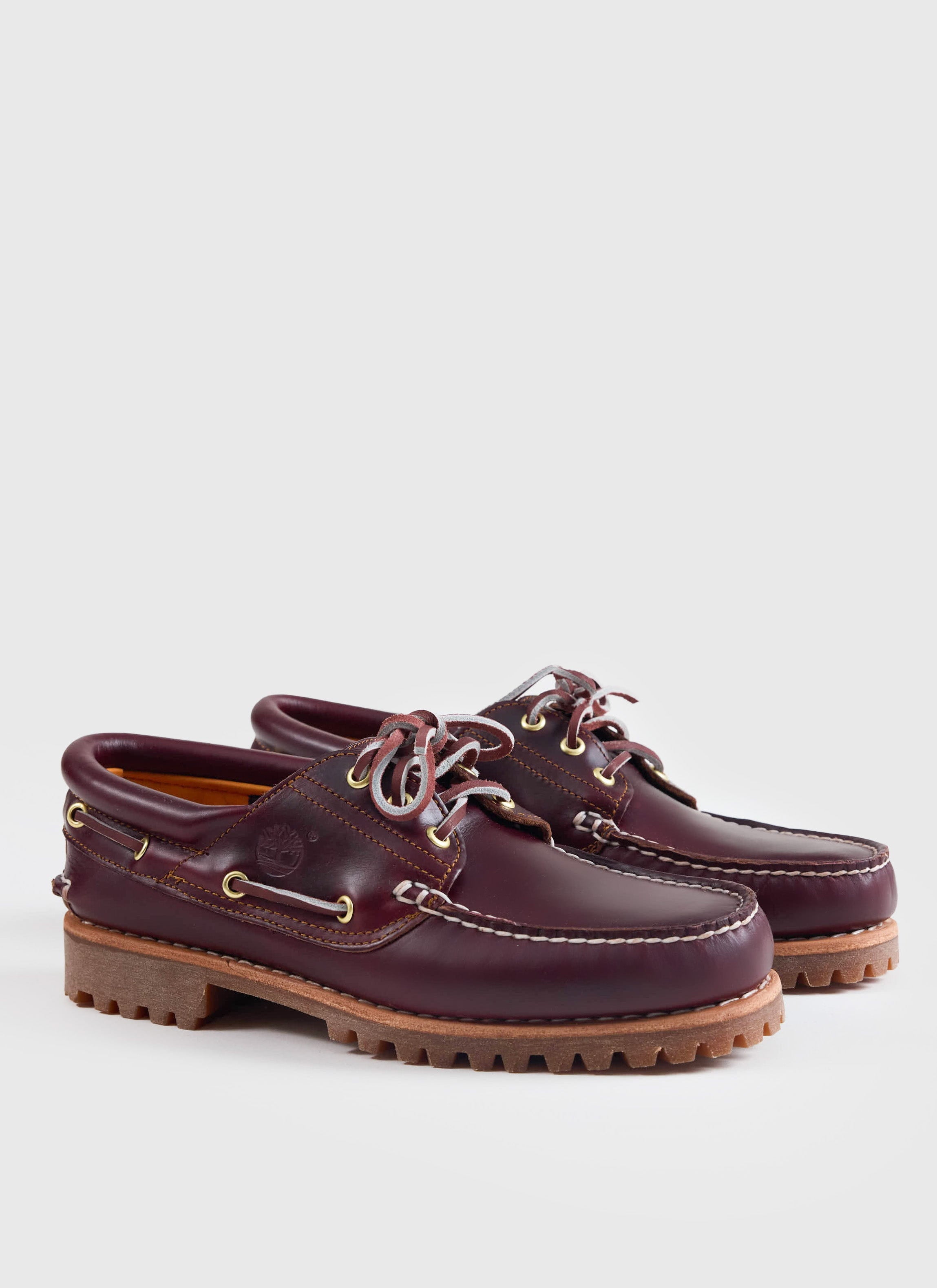 A pair of burgundy leather Timberland Authentic Boat Shoes with a lug outsole and contrast stitching from Percival.