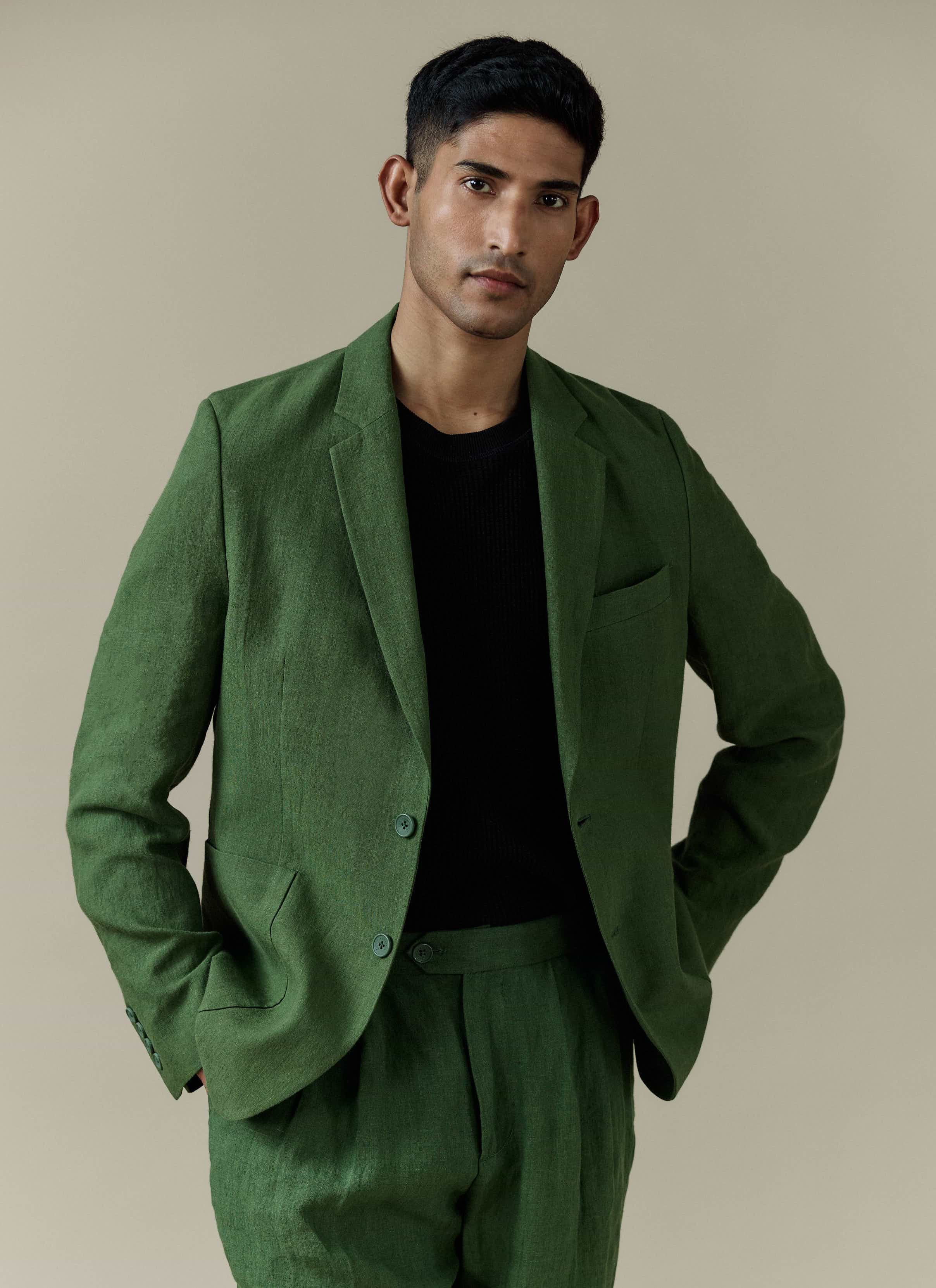 Percival Tailored Linen Blazer in forest green, styled with matching suit trousers and a black t-shirt.
