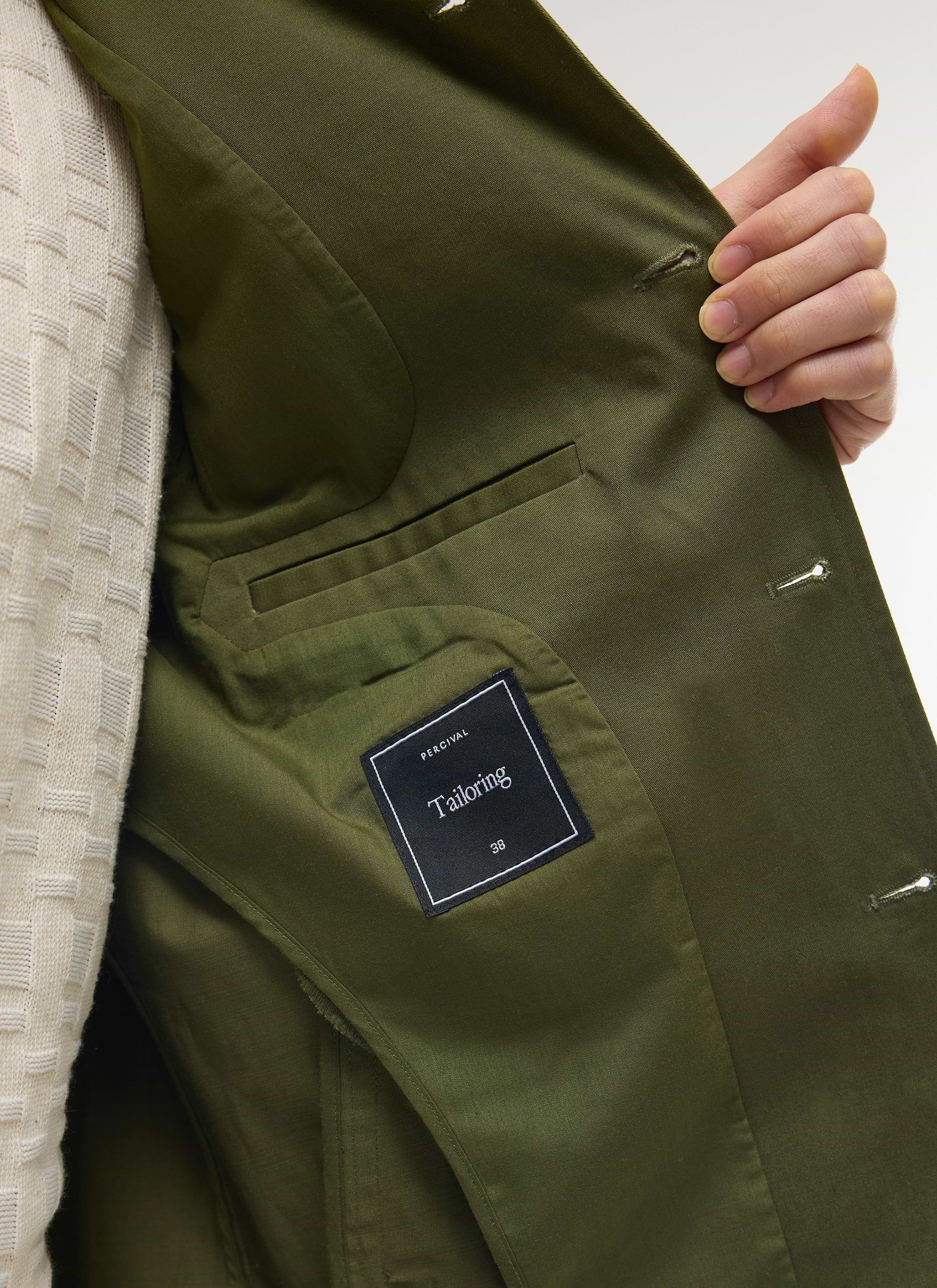 Internal view of the Percival Casual Workwear Jacket in khaki, showing the brand's 'Tailoring' label and jetted pocket.