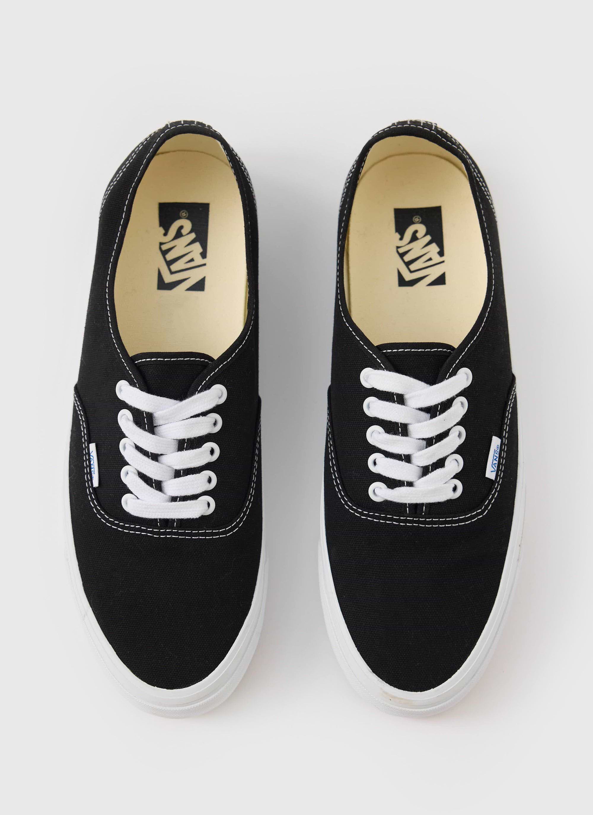 A top-down view of the black and white Vans Premium Authentic 44 trainers, available from Percival menswear.