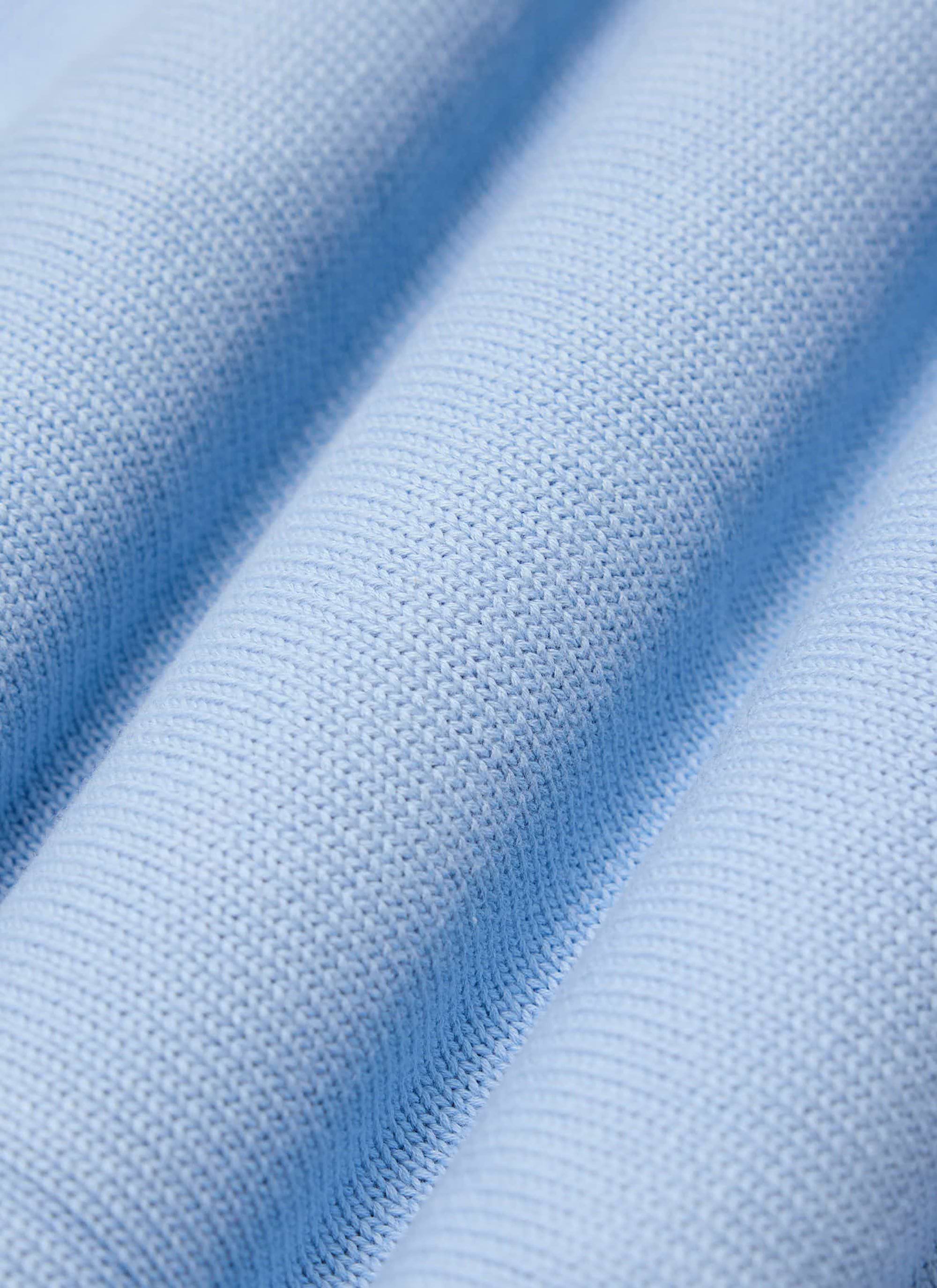 A close-up of the heather blue cotton knit on the Percival Verso Short Sleeve Knitted Shirt.