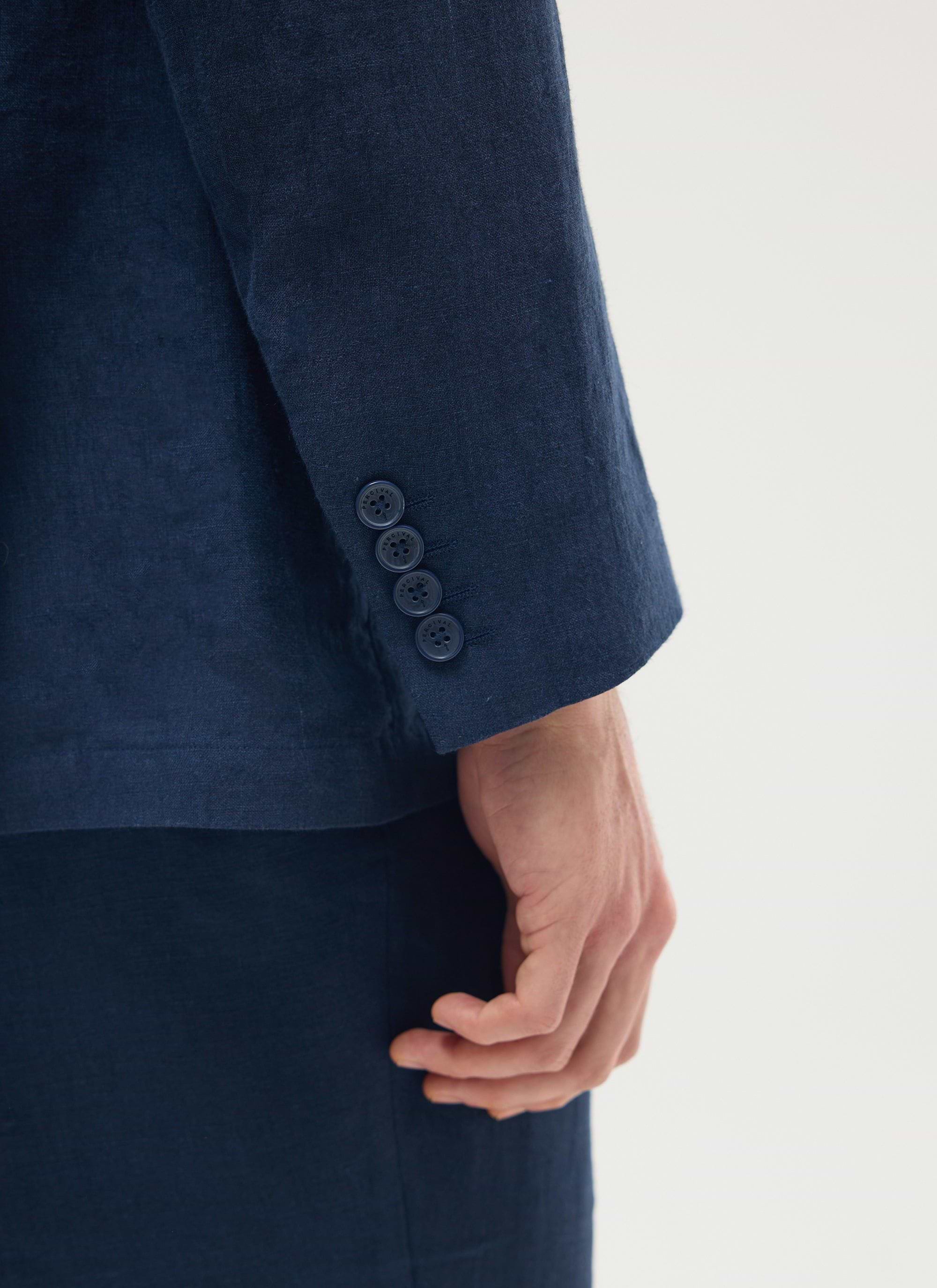 Close up of the cuff and buttons on the navy linen double breasted blazer from Percival.