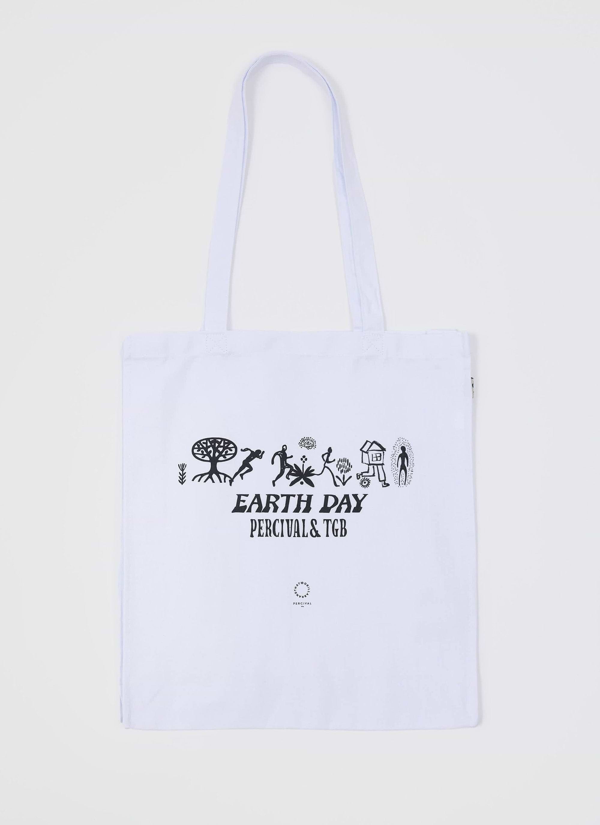 The Percival x The Gorilla Brand tote bag in ecru, with a black 'Earth Day' graphic, shot against a white background.