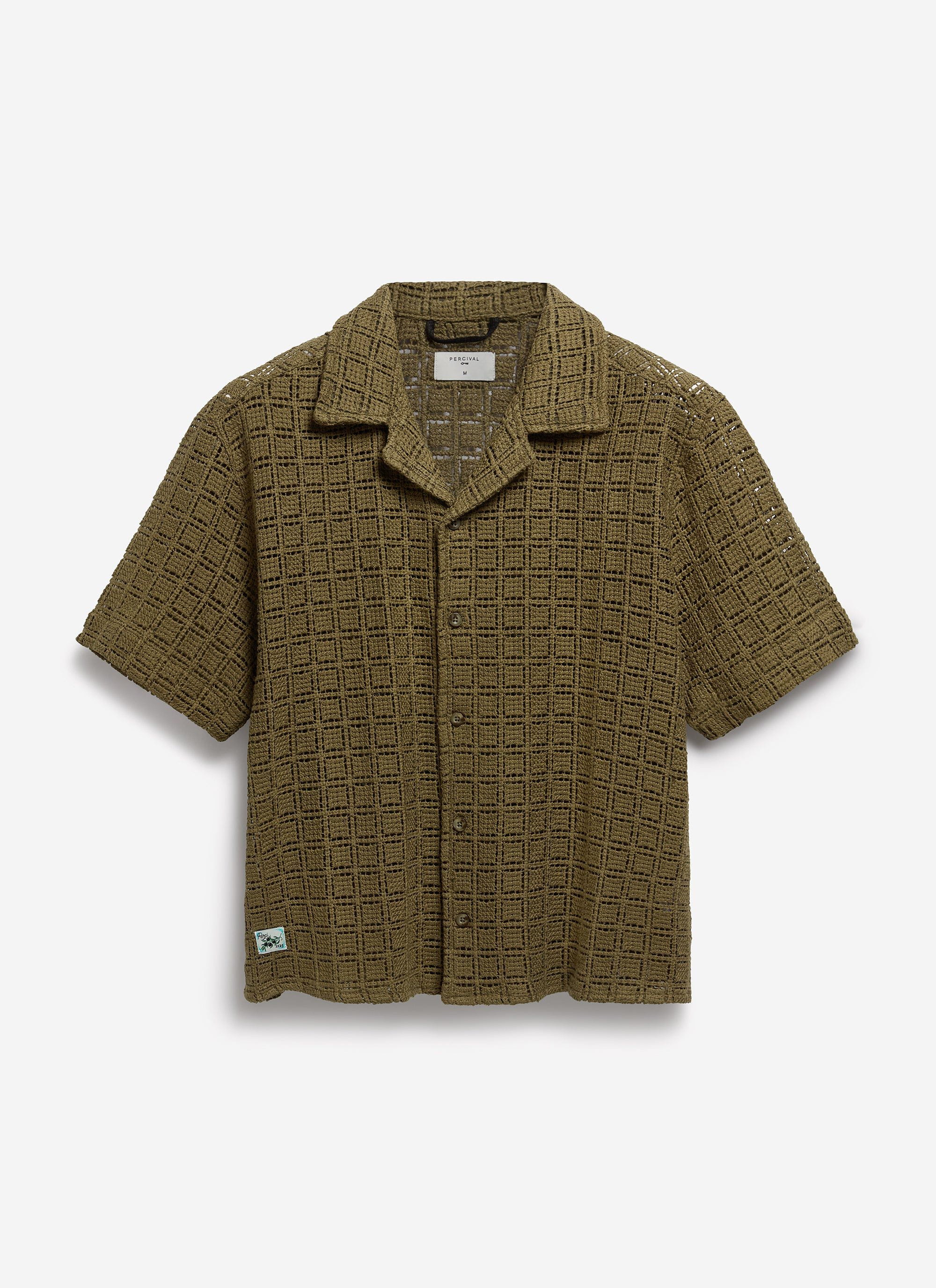 The Percival Palermo Crochet Cuban Shirt in olive green, featuring an intricate crochet pattern, on a white background.