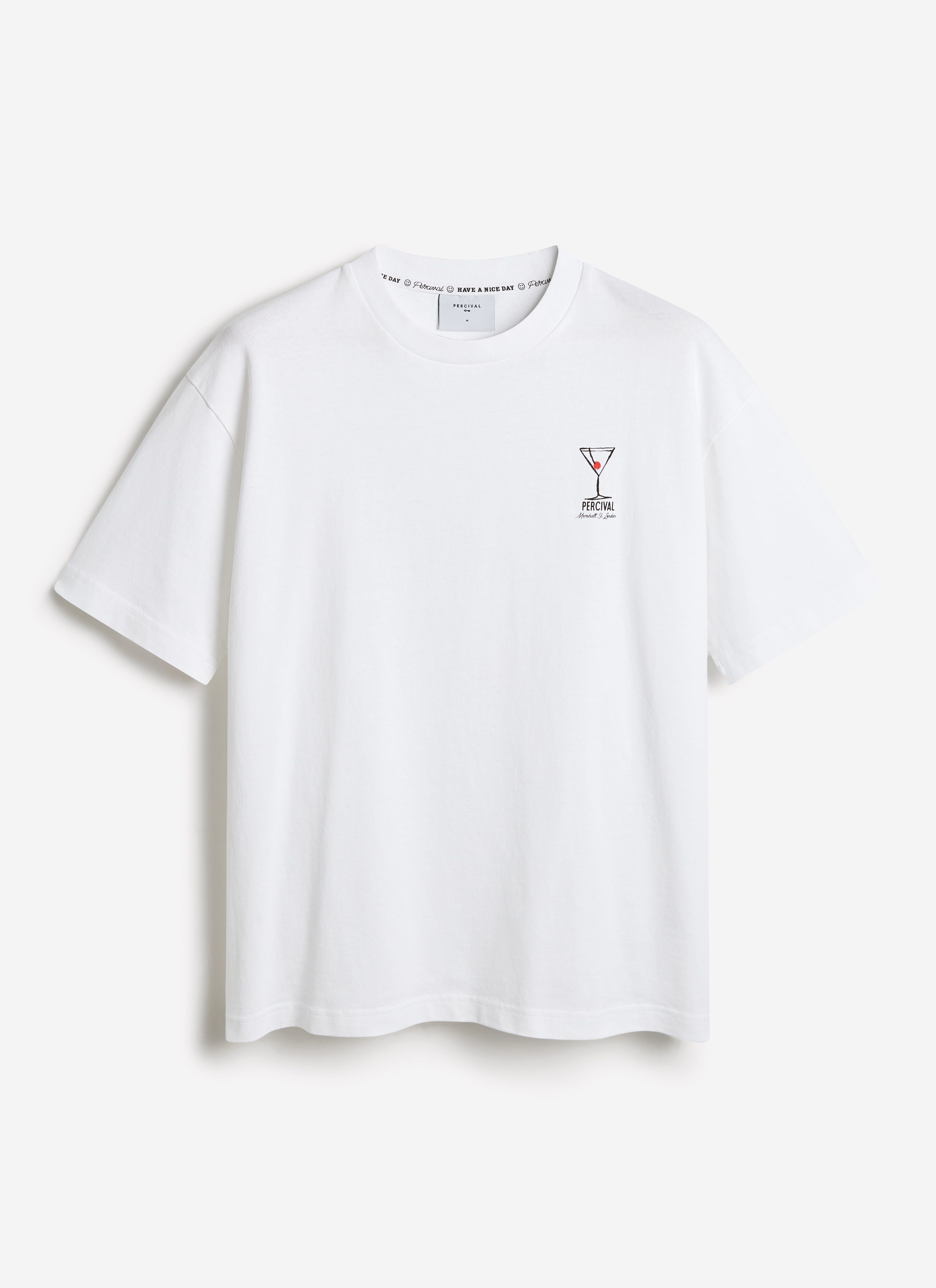 White organic cotton oversized t-shirt by Percival featuring a small martini glass illustration on the chest.
