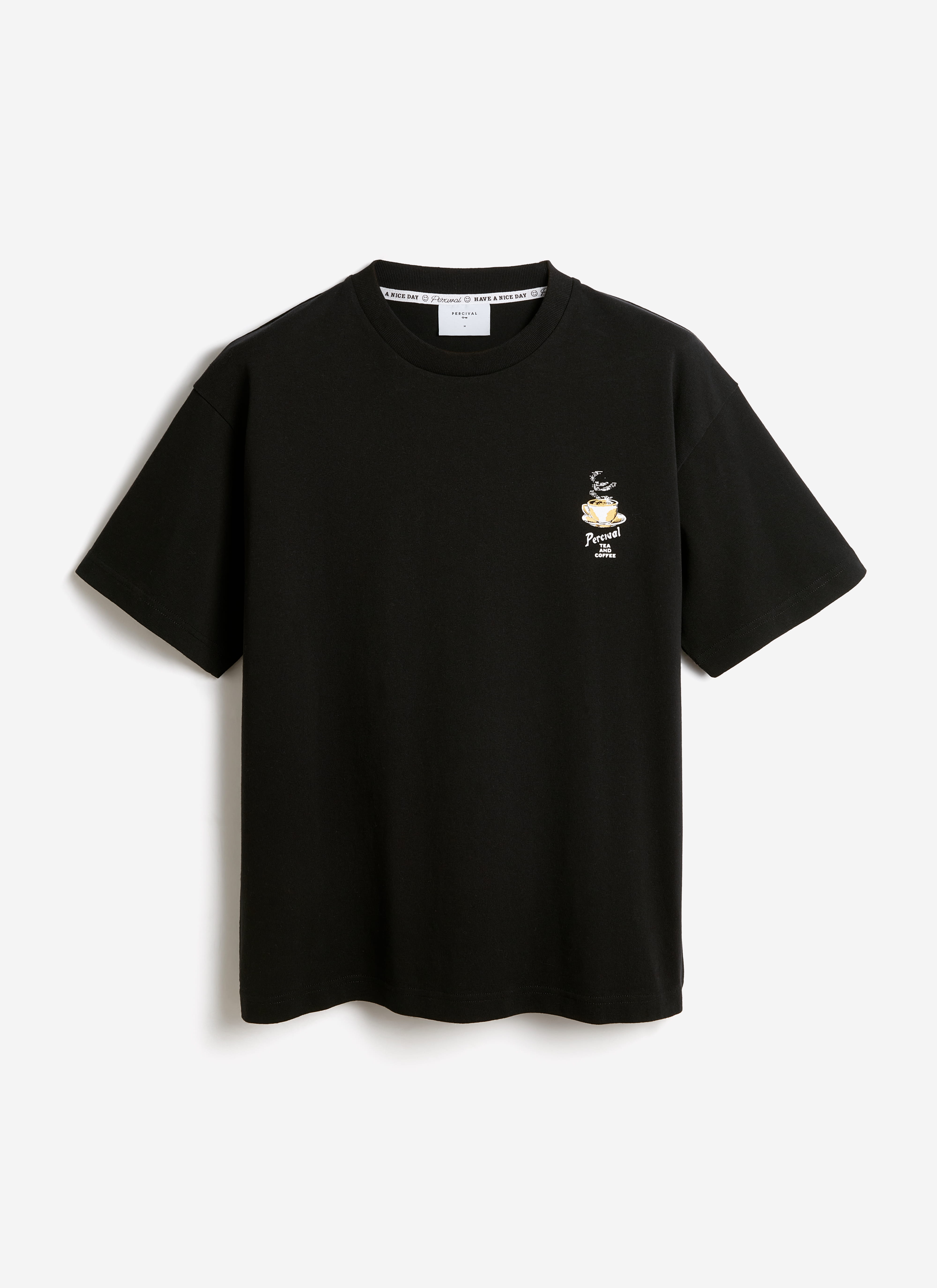 Percival Grill Oversized T Shirt in black organic cotton, featuring a small tea and coffee cup graphic on the chest.