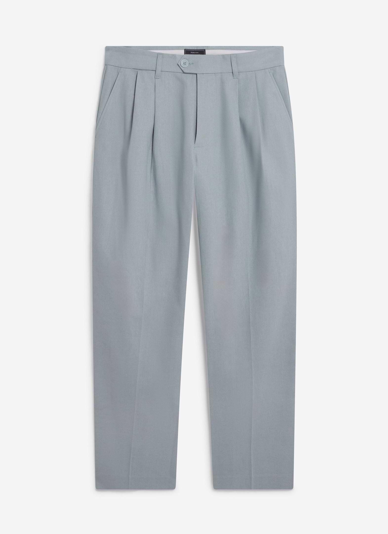 A flat lay of the Percival Pleated Tailored Trousers in a light blue linen blend, showing the front pleat detailing.
