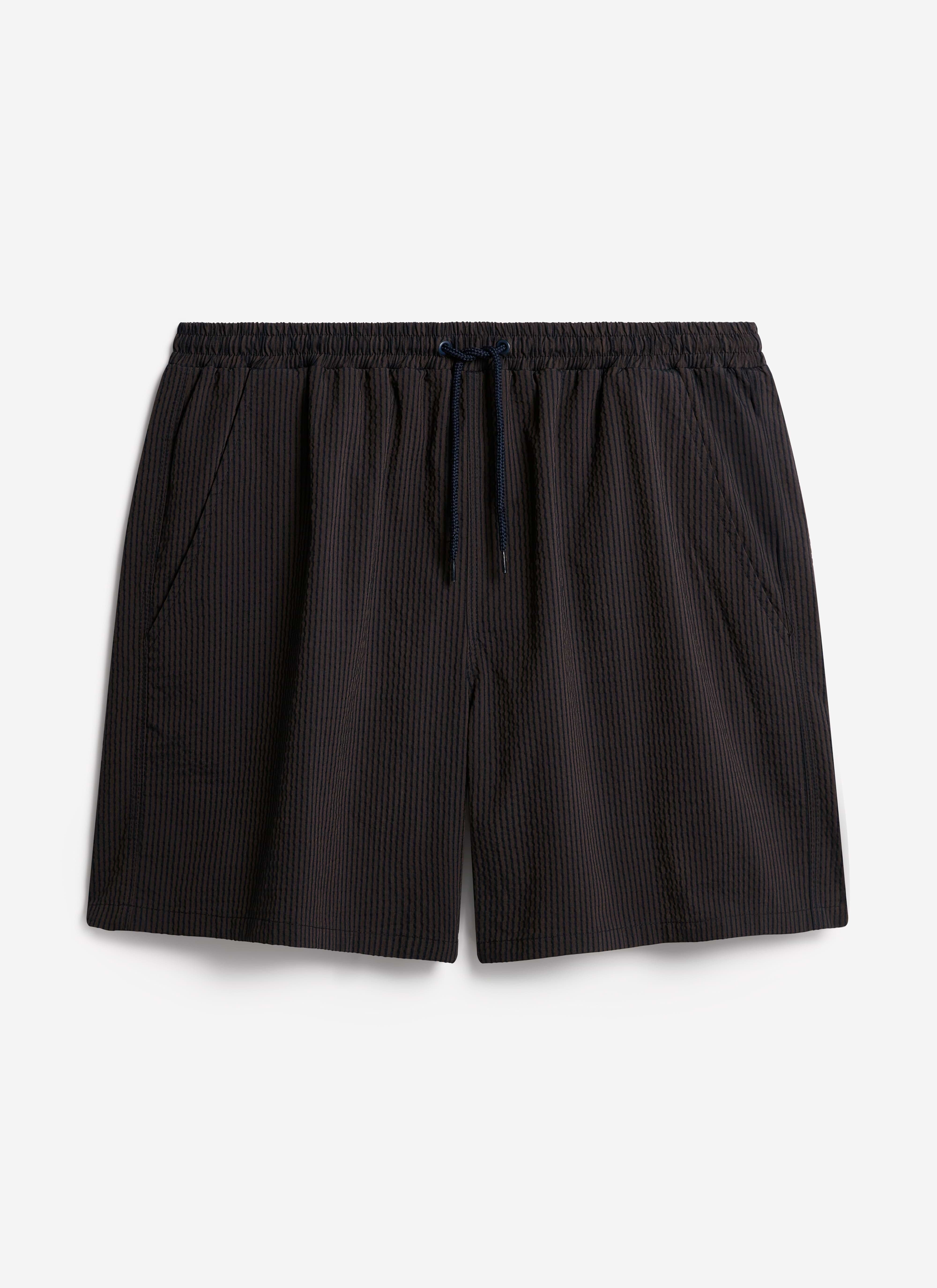 Percival Rowan Seersucker Swim Shorts in navy stripe, made from a textured cotton-blend with an elasticated drawcord.