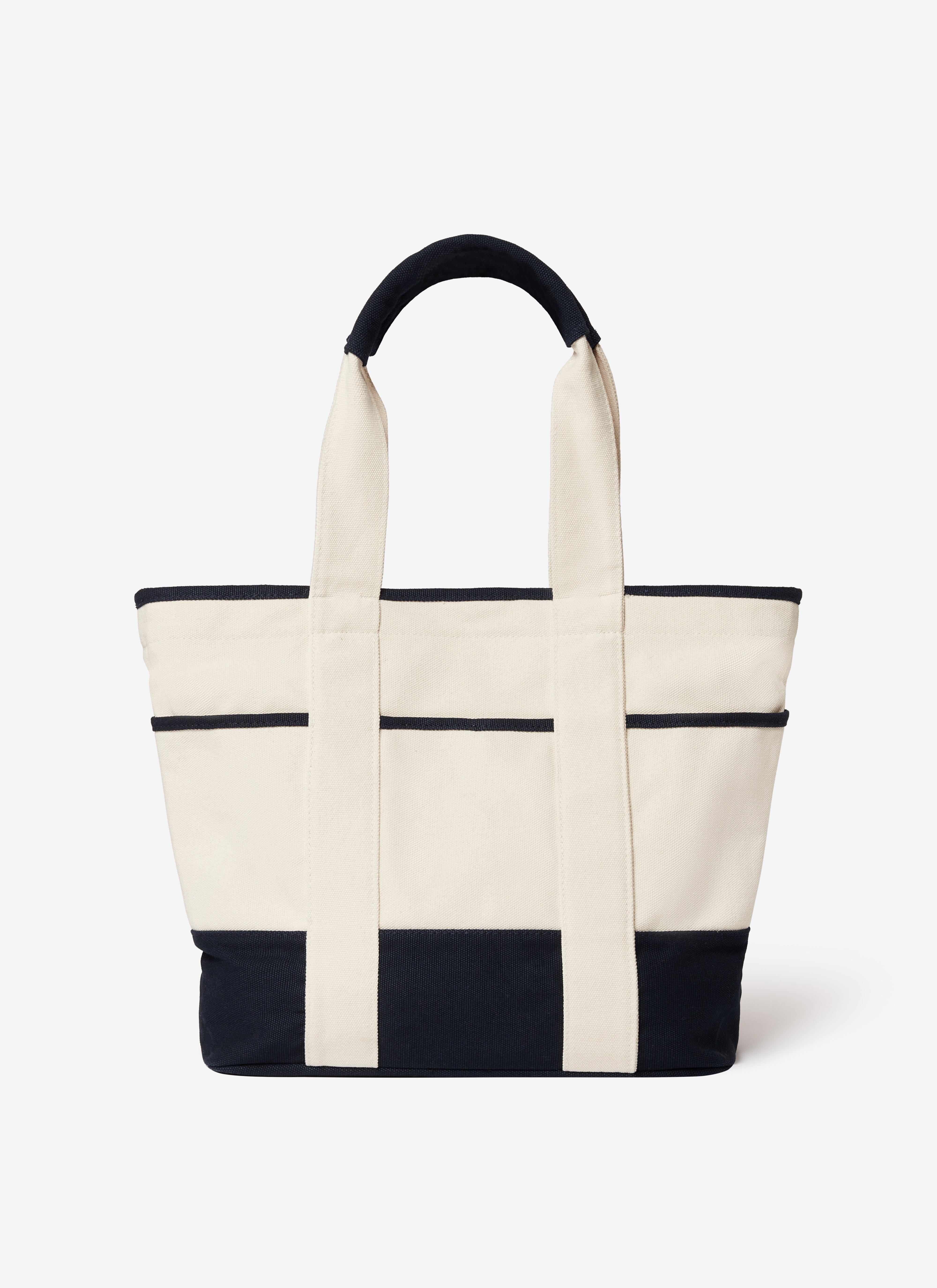 The Brighton & Hove Albion F.C. x Percival canvas tote bag in cream with navy contrast trims.