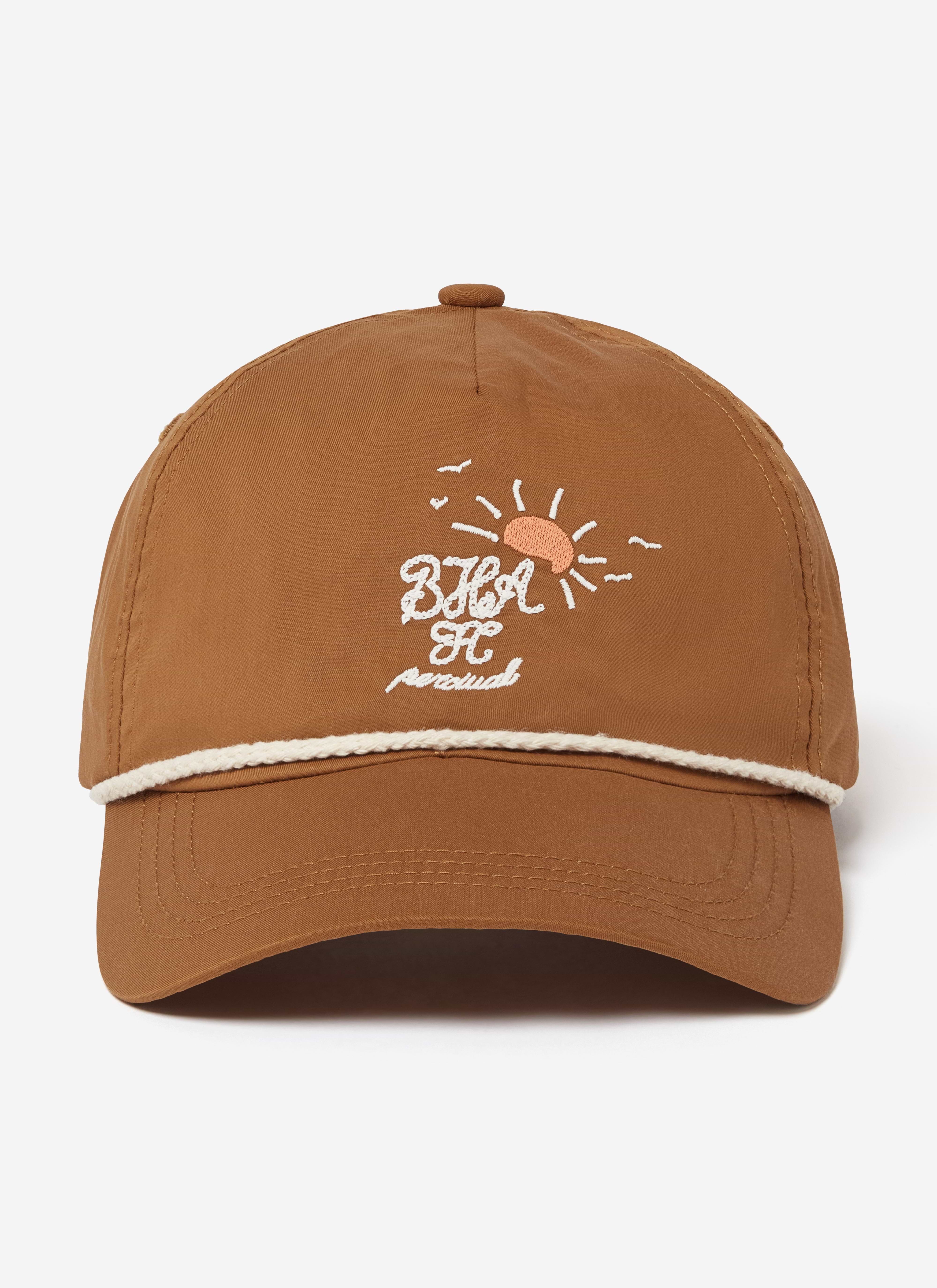 Front view of the rust Percival x Brighton & Hove Albion F.C. trucker cap with white rope trim and custom embroidery.