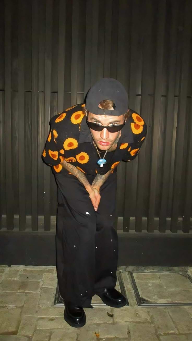 Justin Bieber wearing knitted shirt by Percival Menswear.